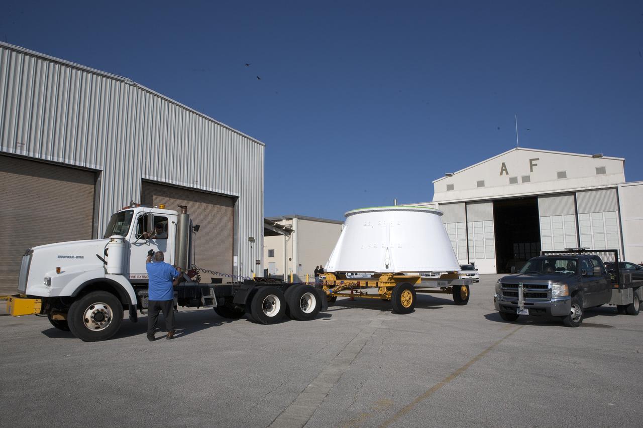 The left hand aft skirt for NASA’s Space Launch System (SLS) rocket is prepared for the move from the Hangar AF facility at Cape Canaveral Air Force Station in Florida, to the Booster Fabrication Facility at the agency’s Kennedy Space Center. The space shuttle-era aft skirt, was inspected, resurfaced, primed and painted for use on the left hand booster of the SLS rocket for Exploration Mission 1 (EM-1). NASA is preparing for EM-1, deep-space missions, and the journey to Mars. 