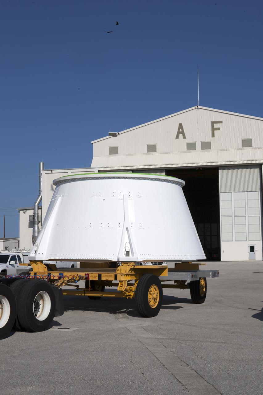 The left hand aft skirt for NASA’s Space Launch System (SLS) rocket is prepared for the move from the Hangar AF facility at Cape Canaveral Air Force Station in Florida, to the Booster Fabrication Facility at the agency’s Kennedy Space Center. The space shuttle-era aft skirt, was inspected, resurfaced, primed and painted for use on the left hand booster of the SLS rocket for Exploration Mission 1 (EM-1). NASA is preparing for EM-1, deep-space missions, and the journey to Mars