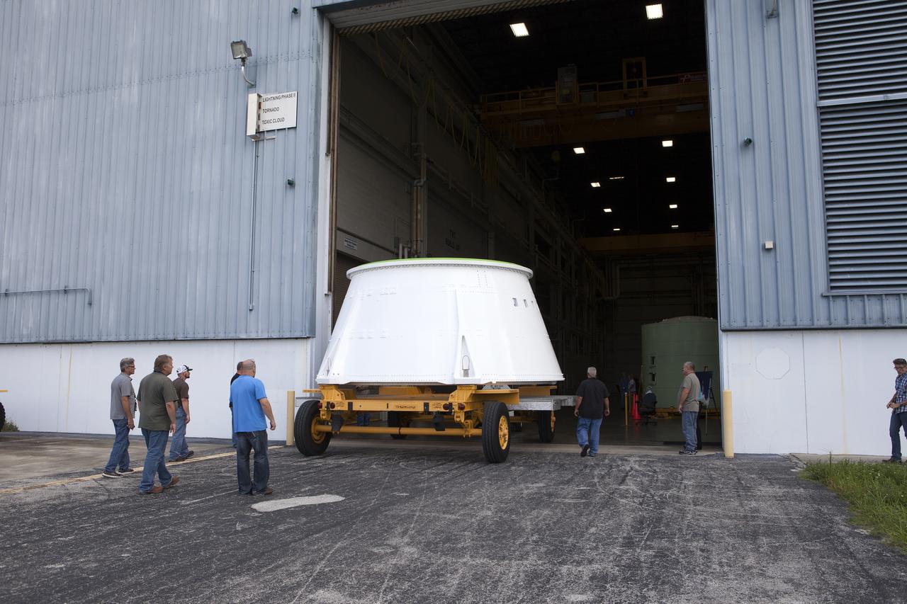The left hand aft skirt for NASA’s Space Launch System (SLS) rocket is moved inside the Booster Fabrication Facility at the agency’s Kennedy Space Center in Florida. The aft skirt arrived from the Hangar AF facility at Cape Canaveral Air Force Station. The space shuttle-era aft skirt, was inspected, resurfaced, primed and painted for use on the left hand booster of the SLS rocket for Exploration Mission 1 (EM-1). NASA is preparing for EM-1, deep-space missions, and the journey to Mars. 