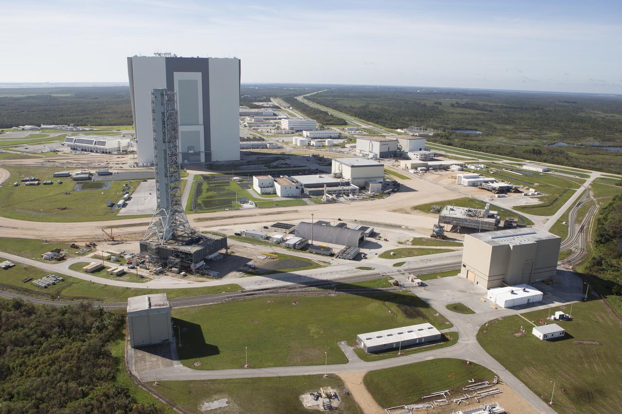 The Launch Complex 39 area is seen during an aerial survey of NASA's Kennedy Space Center in Florida on Saturday. The survey was performed to identify structures and facilities that may have sustained damage from Hurricane Matthew as the storm passed to the east of Kennedy on Oct. 6 and 7, 2016. Officials determined that the center received some isolated roof damage, damaged support buildings, a few downed power lines, and limited water intrusion. Beach erosion also occurred, although the storm surge was less than expected. NASA closed the center ahead of the storm’s onset and only a small team of specialists known as the Rideout Team was on the center as the storm approached and passed.