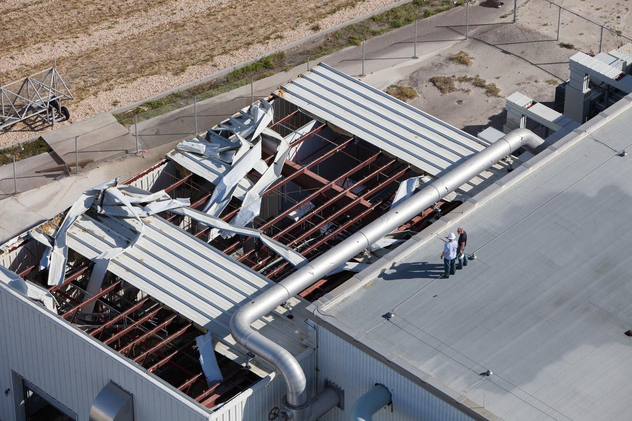 A support building is seen during an aerial survey of NASA's Kennedy Space Center in Florida on Saturday. The survey was performed to identify structures and facilities that may have sustained damage from Hurricane Matthew as the storm passed to the east of Kennedy on Oct. 6 and 7, 2016. Officials determined that the center received some isolated roof damage, damaged support buildings, a few downed power lines, and limited water intrusion. Beach erosion also occurred, although the storm surge was less than expected. NASA closed the center ahead of the storm’s onset and only a small team of specialists known as the Rideout Team was on the center as the storm approached and passed.