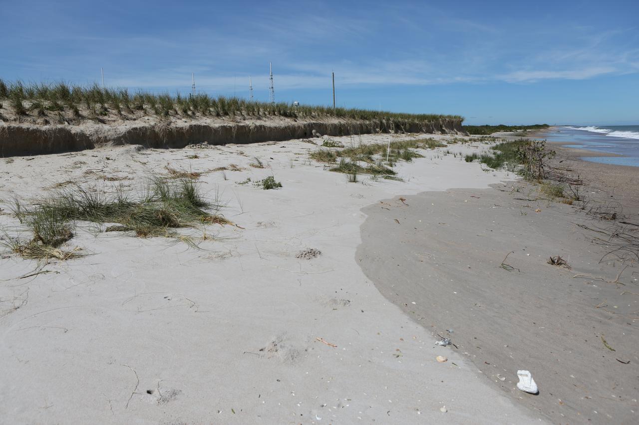 A beach area is seen during a survey of NASA's Kennedy Space Center in Florida on Saturday. The survey was performed to identify structures and facilities that may have sustained damage from Hurricane Matthew as the storm passed to the east of Kennedy on Oct. 6 and 7, 2016. Officials determined that the center received some isolated roof damage, damaged support buildings, a few downed power lines, and limited water intrusion. Beach erosion also occurred, although the storm surge was less than expected. NASA closed the center ahead of the storm’s onset and only a small team of specialists known as the Rideout Team was on the center as the storm approached and passed.