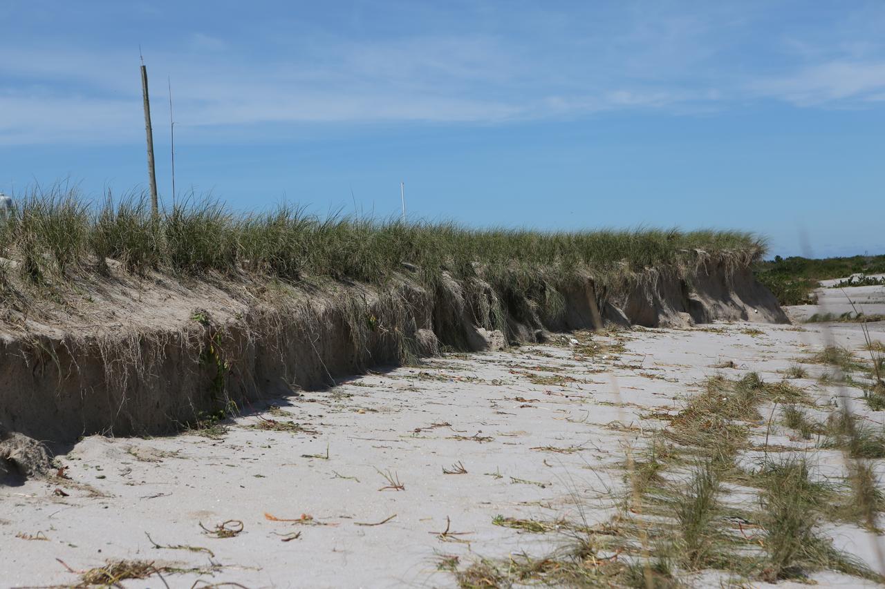 A beach area is seen during a survey of NASA's Kennedy Space Center in Florida on Saturday. The survey was performed to identify structures and facilities that may have sustained damage from Hurricane Matthew as the storm passed to the east of Kennedy on Oct. 6 and 7, 2016. Officials determined that the center received some isolated roof damage, damaged support buildings, a few downed power lines, and limited water intrusion. Beach erosion also occurred, although the storm surge was less than expected. NASA closed the center ahead of the storm’s onset and only a small team of specialists known as the Rideout Team was on the center as the storm approached and passed.