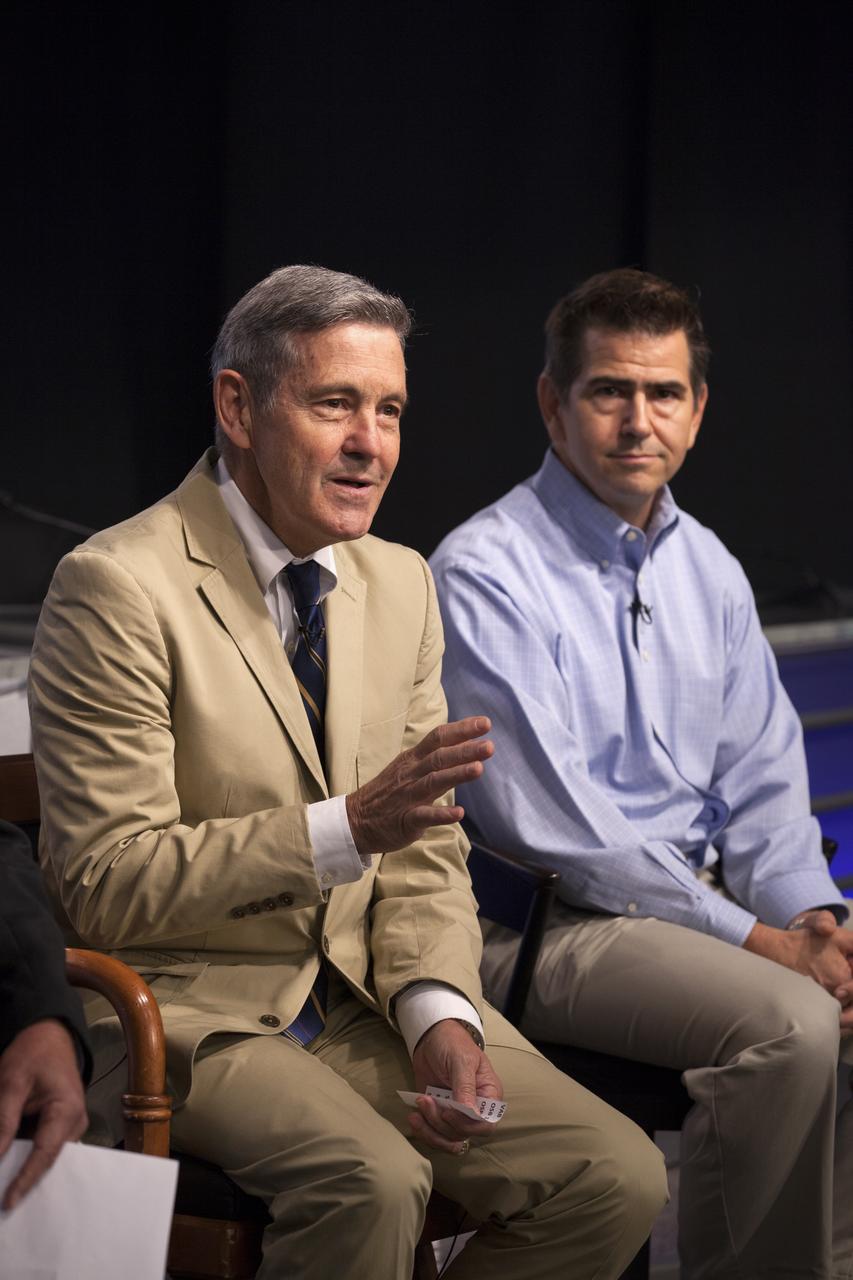 In the Press Site auditorium of NASA's Kennedy Space Center in Florida, Center Director Bob Cabana, left, and Bob Holl, chief of the Kennedy Damage Assessment and Recovery Team, speak to media about efforts to recover from Hurricane Matthew.. Officials determined that the center received some isolated roof damage, damaged support buildings, a few downed power lines, and limited water intrusion. Beach erosion also occurred, although the storm surge was less than expected. NASA closed the center ahead of the storm’s onset and only a small team of specialists known as the Ride-out Team was on the center as the storm approached and passed.