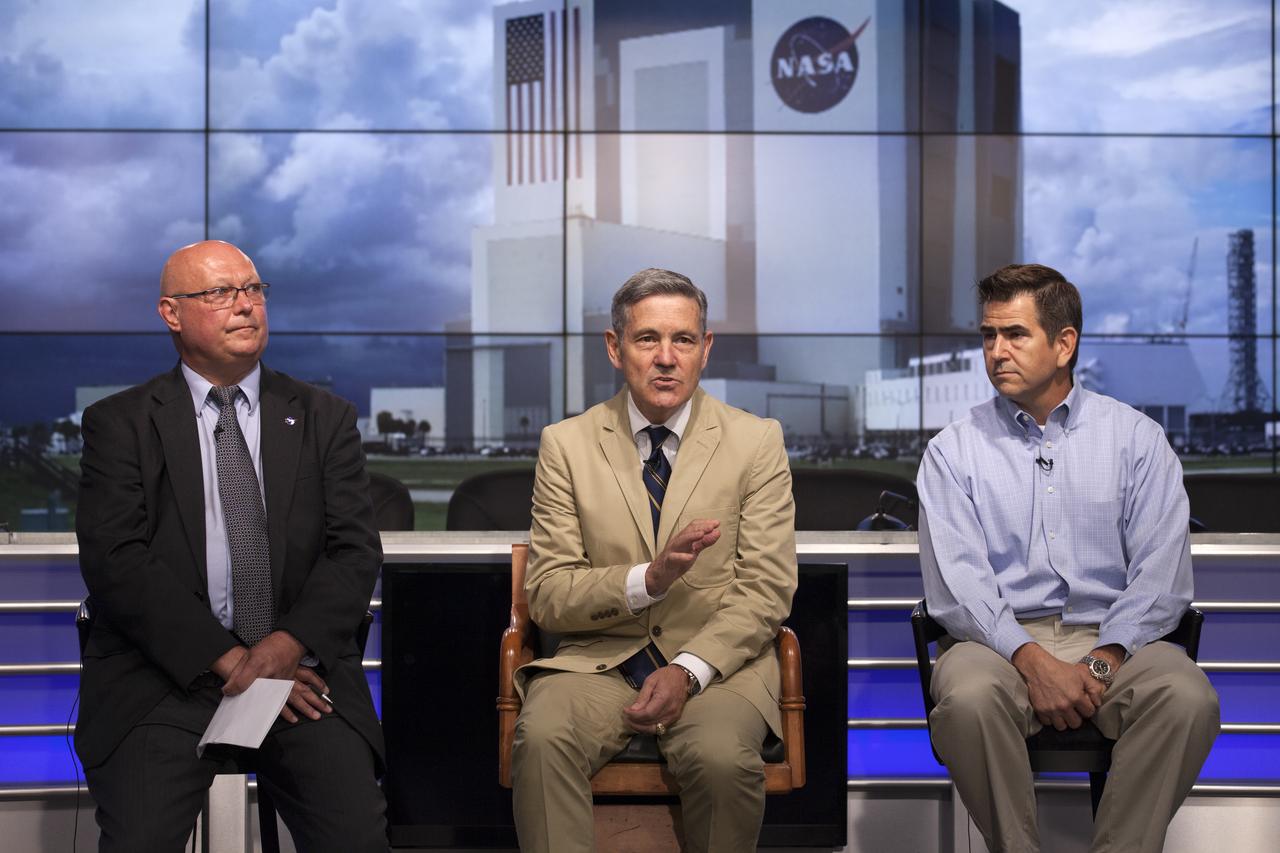 In the Press Site auditorium of NASA's Kennedy Space Center in Florida, NASA officials speak to media about efforts to recover from Hurricane Matthew. From the left are Mike Curie of NASA Communications, Center Director Bob Cabana and Bob Holl, chief of the Kennedy Damage Assessment and Recovery Team. Officials determined that the center received some isolated roof damage, damaged support buildings, a few downed power lines, and limited water intrusion. Beach erosion also occurred, although the storm surge was less than expected. NASA closed the center ahead of the storm’s onset and only a small team of specialists known as the Ride-out Team was on the center as the storm approached and passed.