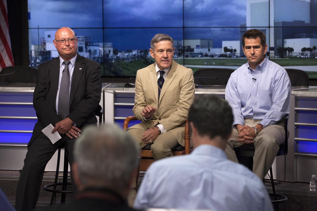 In the Press Site auditorium of NASA's Kennedy Space Center in Florida, NASA officials speak to media about efforts to recover from Hurricane Matthew. From the left are Mike Curie of NASA Communications, Center Director Bob Cabana and Bob Holl, chief of the Kennedy Damage Assessment and Recovery Team. Officials determined that the center received some isolated roof damage, damaged support buildings, a few downed power lines, and limited water intrusion. Beach erosion also occurred, although the storm surge was less than expected. NASA closed the center ahead of the storm’s onset and only a small team of specialists known as the Ride-out Team was on the center as the storm approached and passed.