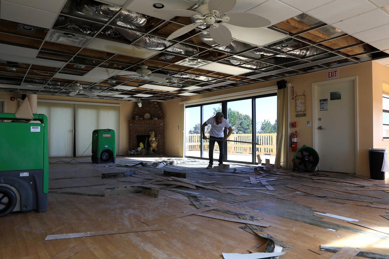 Members of the Disaster Assessment and Recovery Team (DART) work on flooring repairs to the Beach House at NASA’s Kennedy Space Center in Florida.  The effort is part of the spaceport’s ongoing recovery from Hurricane Matthew, which passed to the east of Kennedy on Oct. 6 and 7, 2016. The center received some isolated roof damage, damaged support buildings, a few downed power lines, and limited water intrusion. Beach erosion also occurred, although the storm surge was less than expected.