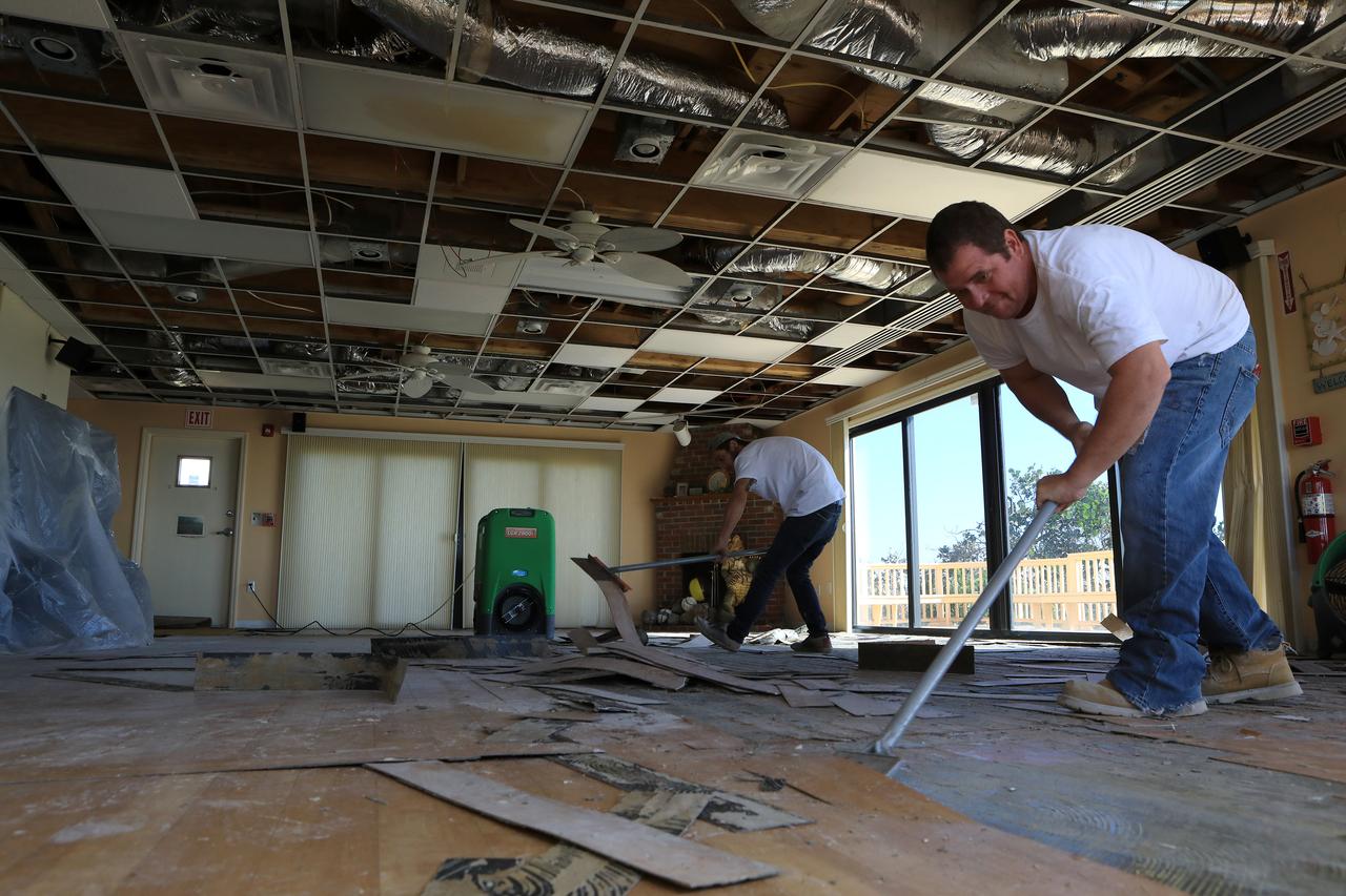 Members of the Disaster Assessment and Recovery Team (DART) work on flooring repairs to the Beach House at NASA’s Kennedy Space Center in Florida.  The effort is part of the spaceport’s ongoing recovery from Hurricane Matthew, which passed to the east of Kennedy on Oct. 6 and 7, 2016. The center received some isolated roof damage, damaged support buildings, a few downed power lines, and limited water intrusion. Beach erosion also occurred, although the storm surge was less than expected.