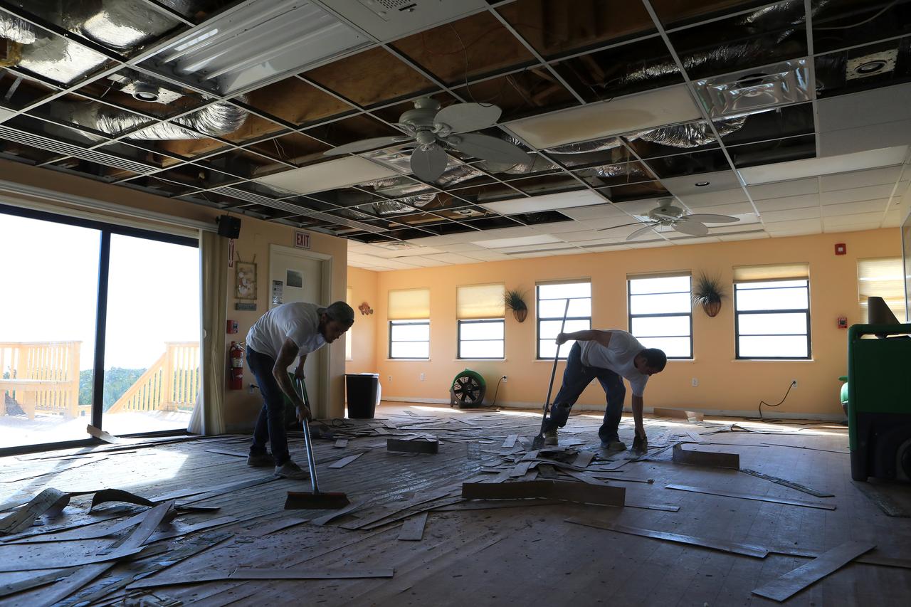 Members of the Disaster Assessment and Recovery Team (DART) work on flooring repairs to the Beach House at NASA’s Kennedy Space Center in Florida.  The effort is part of the spaceport’s ongoing recovery from Hurricane Matthew, which passed to the east of Kennedy on Oct. 6 and 7, 2016. The center received some isolated roof damage, damaged support buildings, a few downed power lines, and limited water intrusion. Beach erosion also occurred, although the storm surge was less than expected.