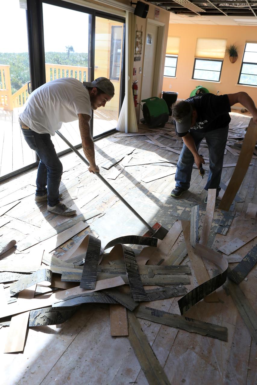 Members of the Disaster Assessment and Recovery Team (DART) work on flooring repairs to the Beach House at NASA’s Kennedy Space Center in Florida.  The effort is part of the spaceport’s ongoing recovery from Hurricane Matthew, which passed to the east of Kennedy on Oct. 6 and 7, 2016. The center received some isolated roof damage, damaged support buildings, a few downed power lines, and limited water intrusion. Beach erosion also occurred, although the storm surge was less than expected.