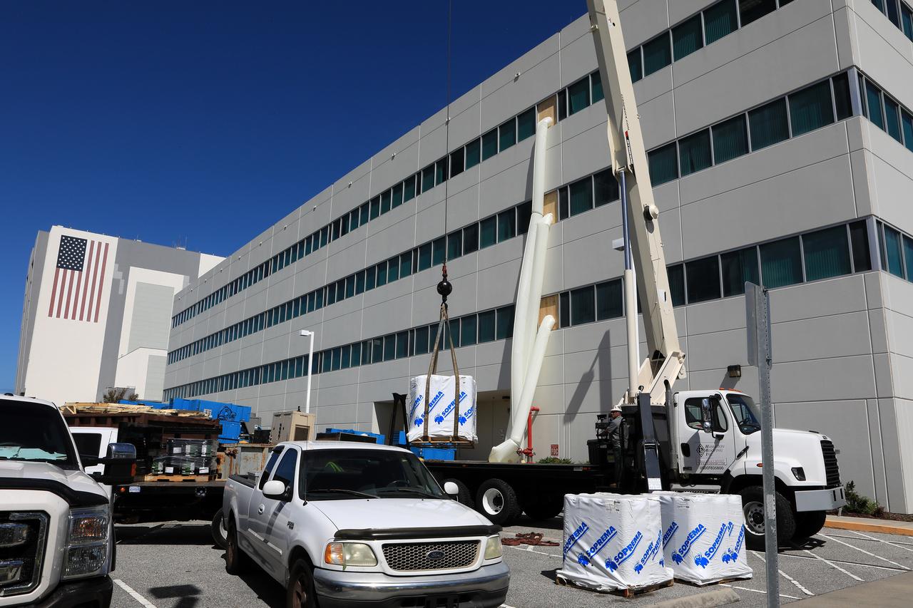 Members of the Disaster Assessment and Recovery Team (DART) work on repairs to the Operations Support Building II at NASA’s Kennedy Space Center in Florida.  The effort is part of the spaceport’s ongoing recovery from Hurricane Matthew, which passed to the east of Kennedy on Oct. 6 and 7, 2016. The center received some isolated roof damage, damaged support buildings, a few downed power lines, and limited water intrusion. Beach erosion also occurred, although the storm surge was less than expected. 