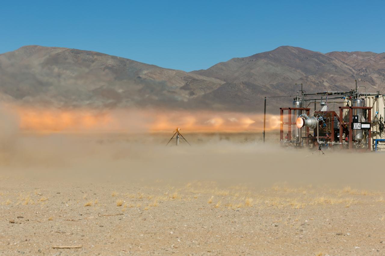 A launch abort engine built by Aerojet Rocketdyne is hot-fired during tests in the Mojave Desert in California. The engine produces up to 40,000 pounds of thrust and burns hypergolic propellants. The engines have been designed and built for use on Boeing’s CST-100 Starliner spacecraft in sets of four. In an emergency at the pad or during ascent, the engines would ignite to push the Starliner and its crew out of danger.