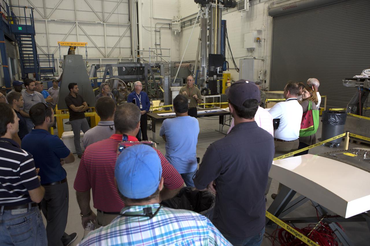 Testing of the Orion Service Module Umbilical (OSMU) was completed at the Launch Equipment Test Facility at NASA’s Kennedy Space Center in Florida. The OSMU was attached to Vehicle Motion Simulator 1 for a series of simulated launch tests to validate it for installation on the mobile launcher. Patrick Simpkins, director of Engineering, speaks to the test team during an event to mark the end of testing. The mobile launcher tower will be equipped with a number of lines, called umbilicals that will connect to the Space Launch System rocket and Orion spacecraft for Exploration Mission-1 (EM-1). The OSMU will be located high on the mobile launcher tower and, prior to launch, will transfer liquid coolant for the electronics and air for the Environmental Control System to the Orion service module that houses these critical systems to support the spacecraft. Kennedy's Engineering Directorate is providing support to the Ground Systems Development and Operations Program for testing of the OSMU. EM-1 is scheduled to launch in 2018.