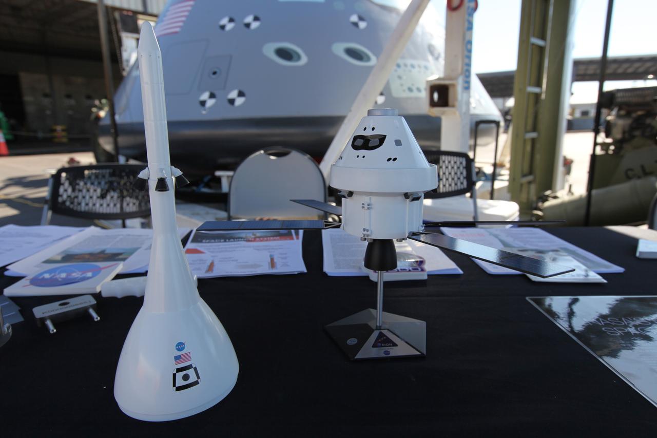 Models of the Orion spacecraft and Launch Abort System are on display for viewing at Naval Base San Diego in California. Service members, base employees and their families will had the opportunity to view a test version of the Orion crew module (in view in the background) before Underway Recovery Test 5 (URT-5). NASA, Orion manufacturer Lockheed Martin and the U.S. Navy will head out to sea with the Orion test vehicle aboard the USS San Diego to demonstrate and evaluate the recovery processes, procedures, hardware and personnel necessary for recovery of Orion on its return from a deep space mission. Orion is the exploration spacecraft designed to carry astronauts to destinations not yet explored by humans, including an asteroid and NASA Journey to Mars. It will have emergency abort capability, sustain the crew during space travel and provide safe re-entry from deep space return velocities. Orion is scheduled to launch atop NASA’s Space Launch System rocket in 2018. For more information, visit http://www.nasa.gov/orion.