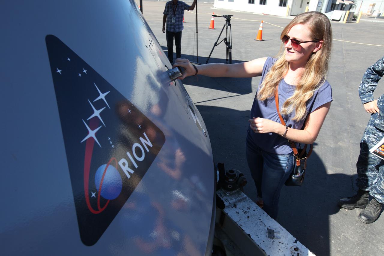 A test version of the Orion crew module is on display for viewing by service members, base employees and their families at Naval Base San Diego in California, before Underway Recovery Test 5 (URT-5). NASA, Orion manufacturer Lockheed Martin and the U.S. Navy will head out to sea with the Orion test vehicle aboard the USS San Diego to demonstrate and evaluate the recovery processes, procedures, hardware and personnel necessary for recovery of Orion on its return from a deep space mission. Orion is the exploration spacecraft designed to carry astronauts to destinations not yet explored by humans, including an asteroid and NASA Journey to Mars. It will have emergency abort capability, sustain the crew during space travel and provide safe re-entry from deep space return velocities. Orion is scheduled to launch atop NASA’s Space Launch System rocket in 2018. For more information, visit http://www.nasa.gov/orion.