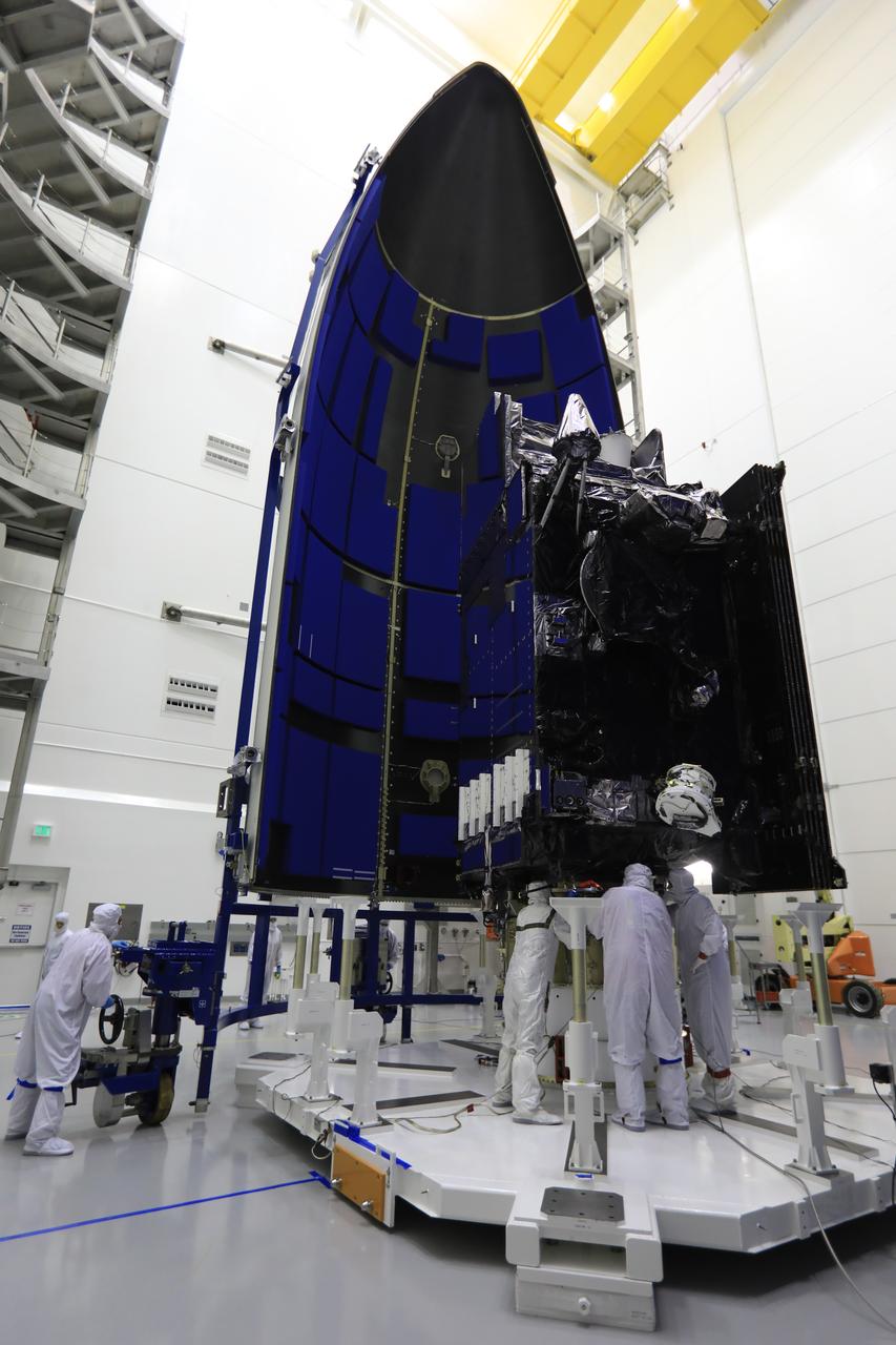 Team members with United Launch Alliance (ULA) prepare the Geostationary Operational Environmental Satellite (GOES-R) for encapsulation in the payload fairing inside the Astrotech payload processing facility in Titusville, Florida near NASA’s Kennedy Space Center. GOES-R will be the first satellite in a series of next-generation NOAA GOES Satellites. The spacecraft is to launch aboard a ULA Atlas V rocket in November. 