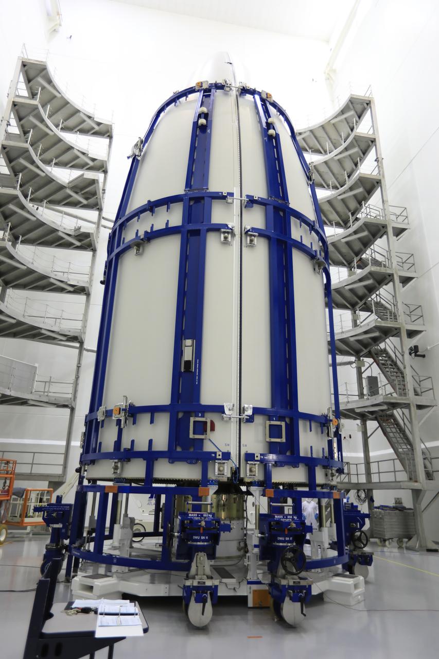 The two halves of the payload fairing are fully closed around the Geostationary Operational Environmental Satellite (GOES-R) inside the Astrotech payload processing facility in Titusville, Florida near NASA’s Kennedy Space Center. GOES-R will be the first satellite in a series of next-generation NOAA GOES Satellites. The spacecraft is to launch aboard a United Launch Alliance Atlas V rocket in November. 