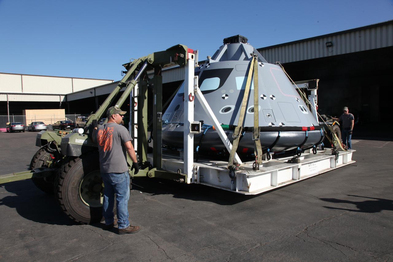 Preparations are underway to transport the test version of the Orion crew module onto the USS San Diego at Naval Base San Diego in California. NASA, Orion manufacturer Lockheed Martin and the U.S. Navy will head out to sea with the Orion test spacecraft aboard for Underway Recovery Test 5 (URT-5) in the Pacific Ocean off the coast of California. During URT-5, the team will demonstrate and evaluate the recovery processes, procedures, hardware and personnel necessary for recovery of Orion on its return from a deep space mission. Orion is the exploration spacecraft designed to carry astronauts to destinations not yet explored by humans, including an asteroid and NASA Journey to Mars. It will have emergency abort capability, sustain the crew during space travel and provide safe re-entry from deep space return velocities. Orion is scheduled to launch atop NASA’s Space Launch System rocket in 2018. For more information, visit http://www.nasa.gov/orion. 