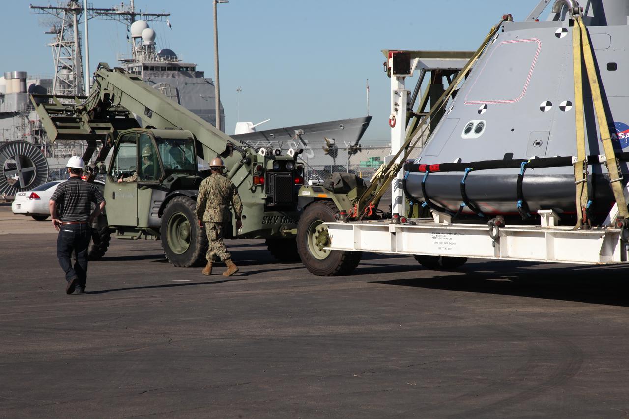 Preparations are underway to transport the test version of the Orion crew module onto the USS San Diego at Naval Base San Diego in California. NASA, Orion manufacturer Lockheed Martin and the U.S. Navy will head out to sea with the Orion test spacecraft aboard for Underway Recovery Test 5 (URT-5) in the Pacific Ocean off the coast of California. During URT-5, the team will demonstrate and evaluate the recovery processes, procedures, hardware and personnel necessary for recovery of Orion on its return from a deep space mission. Orion is the exploration spacecraft designed to carry astronauts to destinations not yet explored by humans, including an asteroid and NASA Journey to Mars. It will have emergency abort capability, sustain the crew during space travel and provide safe re-entry from deep space return velocities. Orion is scheduled to launch atop NASA’s Space Launch System rocket in 2018. For more information, visit http://www.nasa.gov/orion. 