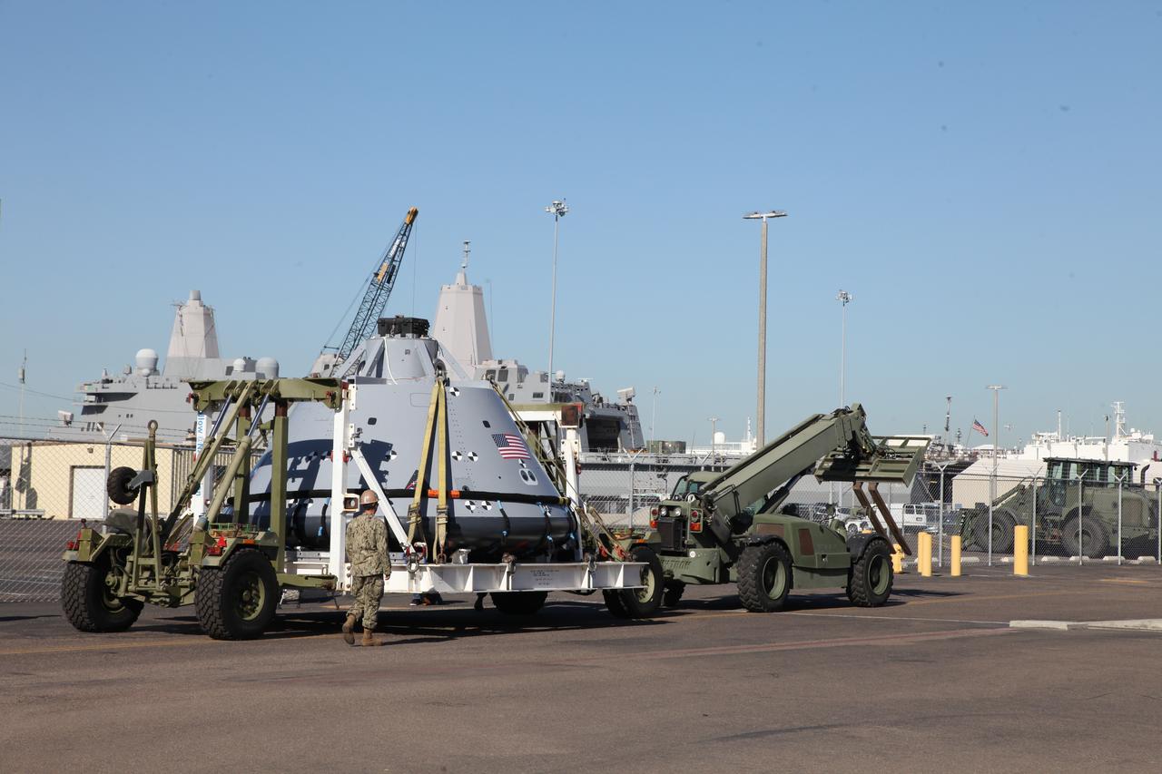 The test version of the Orion crew module is transported to the USS San Diego at Naval Base San Diego in California. NASA, Orion manufacturer Lockheed Martin and the U.S. Navy will head out to sea with the Orion test spacecraft aboard for Underway Recovery Test 5 (URT-5) in the Pacific Ocean off the coast of California. During URT-5, the team will demonstrate and evaluate the recovery processes, procedures, hardware and personnel necessary for recovery of Orion on its return from a deep space mission. Orion is the exploration spacecraft designed to carry astronauts to destinations not yet explored by humans, including an asteroid and NASA Journey to Mars. It will have emergency abort capability, sustain the crew during space travel and provide safe re-entry from deep space return velocities. Orion is scheduled to launch atop NASA’s Space Launch System rocket in 2018. For more information, visit http://www.nasa.gov/orion. 