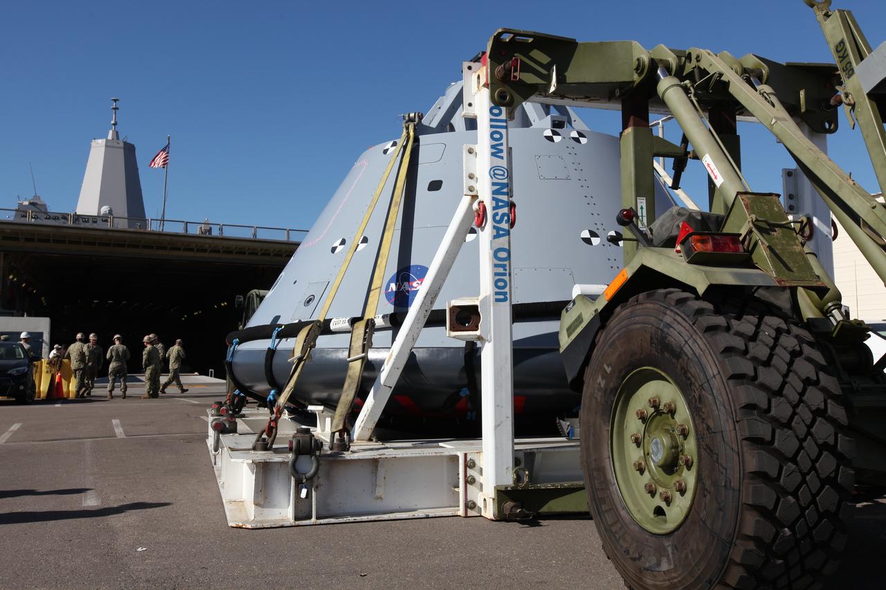 The test version of the Orion crew module is transported to the USS San Diego at Naval Base San Diego in California. NASA, Orion manufacturer Lockheed Martin and the U.S. Navy will head out to sea with the Orion test spacecraft aboard for Underway Recovery Test 5 (URT-5) in the Pacific Ocean off the coast of California. During URT-5, the team will demonstrate and evaluate the recovery processes, procedures, hardware and personnel necessary for recovery of Orion on its return from a deep space mission. Orion is the exploration spacecraft designed to carry astronauts to destinations not yet explored by humans, including an asteroid and NASA Journey to Mars. It will have emergency abort capability, sustain the crew during space travel and provide safe re-entry from deep space return velocities. Orion is scheduled to launch atop NASA’s Space Launch System rocket in 2018. For more information, visit http://www.nasa.gov/orion. 