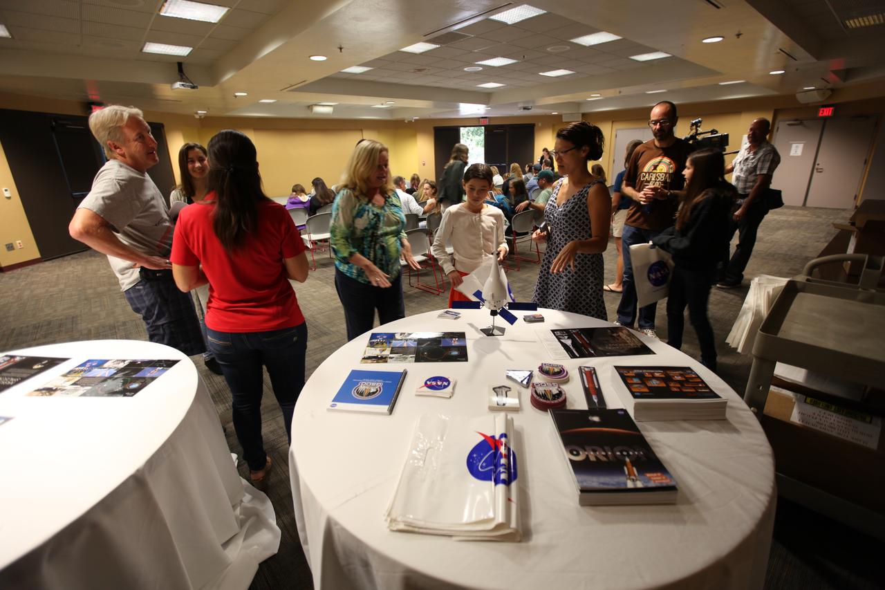 Representatives from NASA’s Ground Systems Development and Operations Program (GSDO) prepare for a “Be Wise” program at the Reuben H. Fleet Science Center in San Diego, California. GSDO participated in several outreach events to students and the general public before the start of the Orion Underway Recovery Test 5 (URT-5) using a test version of the Orion crew module in the Pacific Ocean. URT-5 will allow NASA and the U.S. Navy to demonstrate and evaluate the recovery processes, procedures, hardware and personnel necessary for recovery of the Orion crew module on its return from a deep space mission. Orion is the exploration spacecraft designed to carry astronauts to destinations not yet explored by humans, including an asteroid and NASA’s Journey to Mars. It will have emergency abort capability, sustain the crew during space travel and provide safe re-entry from deep space return velocities. Orion is scheduled to launch atop NASA’s Space Launch System rocket in 2018. For more information, visit http://www.nasa.gov/orion.