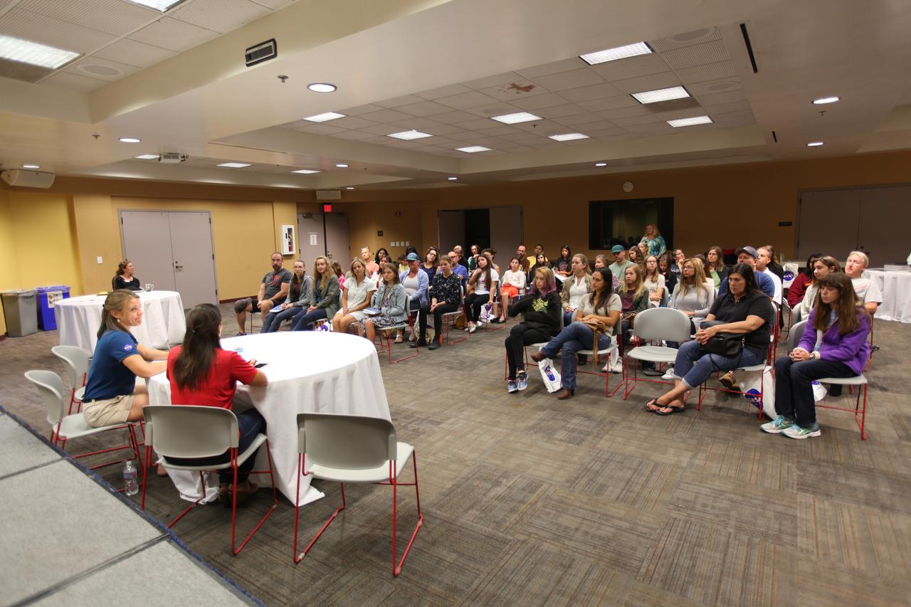 NASA’s Ground Systems Development and Operations Program (GSDO) participates in a “Be Wise” program at the Reuben H. Fleet Science Center in San Diego, California. At the front table, from left are GSDO engineers Carla Koch and Janet Gobaira from the agency’s Kennedy Space Center in Florida. GSDO participated in several outreach events to students and the general public before the start of the Orion Underway Recovery Test 5 (URT-5) using a test version of the Orion crew module in the Pacific Ocean. URT-5 will allow NASA and the U.S. Navy to demonstrate and evaluate the recovery processes, procedures, hardware and personnel necessary for recovery of the Orion crew module on its return from a deep space mission. Orion is the exploration spacecraft designed to carry astronauts to destinations not yet explored by humans, including an asteroid and NASA’s Journey to Mars. It will have emergency abort capability, sustain the crew during space travel and provide safe re-entry from deep space return velocities. Orion is scheduled to launch atop NASA’s Space Launch System rocket in 2018. For more information, visit http://www.nasa.gov/orion.