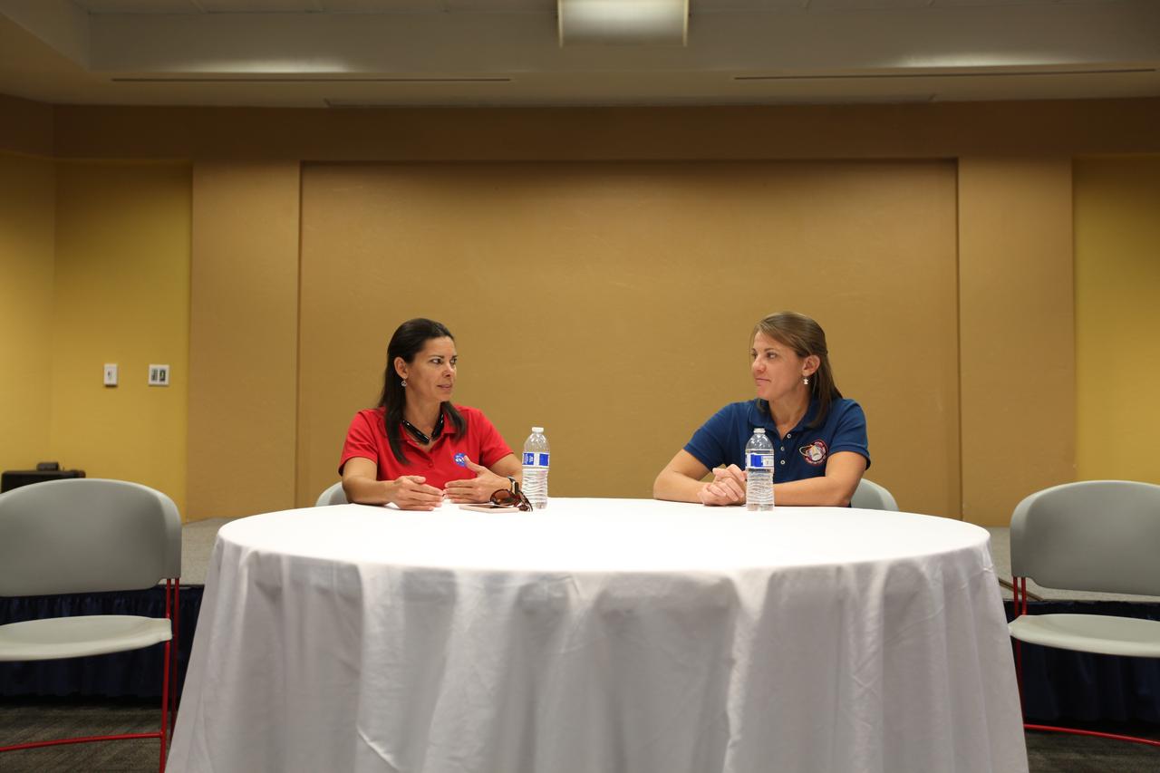 NASA’s Ground Systems Development and Operations Program (GSDO) participates in a “Be Wise” program at the Reuben H. Fleet Science Center in San Diego, California. From left, are GSDO engineers Janet Gobaira and Carla Koch from the agency’s Kennedy Space Center in Florida. GSDO participated in several outreach events to students and the general public before the start of the Orion Underway Recovery Test 5 (URT-5) using a test version of the Orion crew module in the Pacific Ocean. URT-5 will allow NASA and the U.S. Navy to demonstrate and evaluate the recovery processes, procedures, hardware and personnel necessary for recovery of the Orion crew module on its return from a deep space mission. Orion is the exploration spacecraft designed to carry astronauts to destinations not yet explored by humans, including an asteroid and NASA’s Journey to Mars. It will have emergency abort capability, sustain the crew during space travel and provide safe re-entry from deep space return velocities. Orion is scheduled to launch atop NASA’s Space Launch System rocket in 2018. For more information, visit http://www.nasa.gov/orion. 