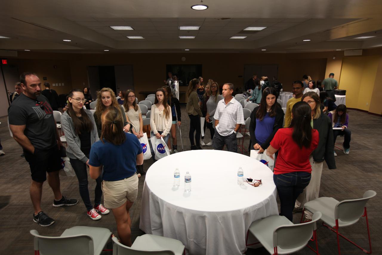 NASA’s Ground Systems Development and Operations Program (GSDO) participates in a “Be Wise” program at the Reuben H. Fleet Science Center in San Diego, California. Carla Koch, left, and Janet Gobaira, engineers from Kennedy Space Center in Florida, talk with participants after the program. GSDO participated in several outreach events to students and the general public before the start of the Orion Underway Recovery Test 5 (URT-5) using a test version of the Orion crew module in the Pacific Ocean. URT-5 will allow NASA and the U.S. Navy to demonstrate and evaluate the recovery processes, procedures, hardware and personnel necessary for recovery of the Orion crew module on its return from a deep space mission. Orion is the exploration spacecraft designed to carry astronauts to destinations not yet explored by humans, including an asteroid and NASA’s Journey to Mars. It will have emergency abort capability, sustain the crew during space travel and provide safe re-entry from deep space return velocities. Orion is scheduled to launch atop NASA’s Space Launch System rocket in 2018. For more information, visit http://www.nasa.gov/orion. 