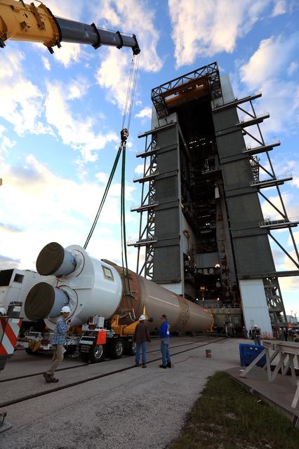 NASA image: GOES-R Atlas V Transport from ASOC to VIF; Lift to Vertical on S