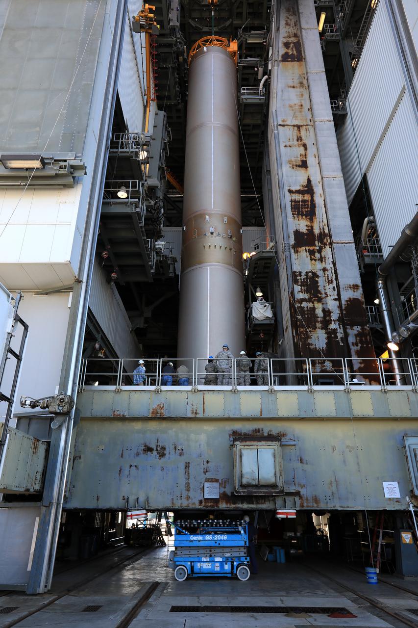 The United Launch Alliance Atlas V first stage is in the vertical position in the Vertical Integration Facility at Space Launch Complex 41 at Cape Canaveral Air Force Station in Florida. The Geostationary Operational Environmental Satellite (GOES-R) will launch aboard the Atlas V rocket in November. GOES-R will be the first satellite in a series of next-generation NOAA GOES Satellites. 