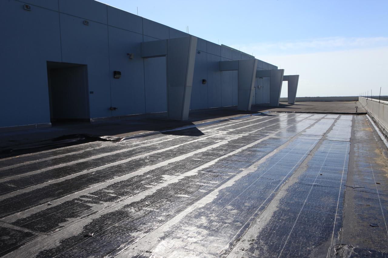 Following Hurricane Matthew, repairs have been made to the roof of the Operations Support Building (OSB) II in the Launch Complex 39 area at NASA's Kennedy Space Center in Florida. Assessments and repairs continue on various structures and facilities across the spaceport, part of the ongoing recovery from the storm, which passed to the east of Kennedy on Oct. 6 and 7, 2016. The center received some isolated roof damage, damaged support buildings, a few downed power lines, and limited water intrusion. Beach erosion also occurred, although the storm surge was less than expected.