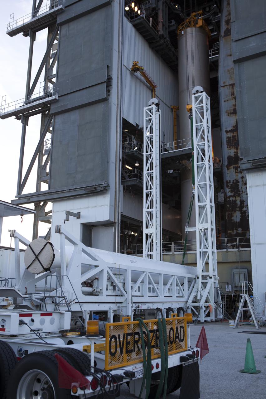 Preparations are underway to lift the solid rocket motor up from its transporter for mating to the United Launch Alliance Atlas V rocket in the Vertical Integration Facility at Space Launch Complex 41 at Cape Canaveral Air Force Station in Florida. NOAA's Geostationary Operational Environmental Satellite (GOES-R) will launch aboard the Atlas V rocket this month. GOES-R is the first satellite in a series of next-generation NOAA GOES Satellites.
