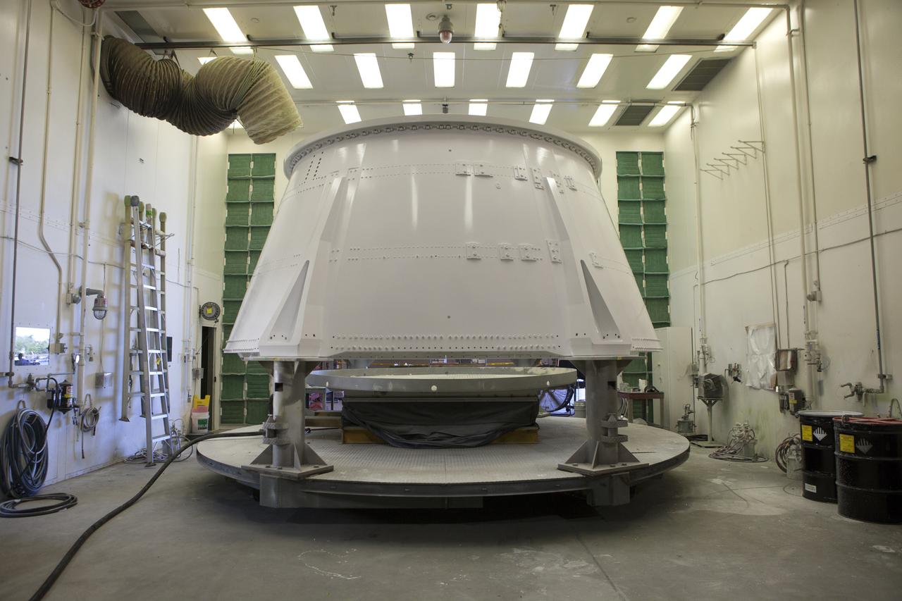 The right hand aft skirt for NASA's Space Launch System (SLS) rocket has been refurbished and painted and is in a drying cell in a support building at the Hangar AF facility at Cape Canaveral Air Force Station in Florida. The space shuttle-era aft skirt will be used on the right hand booster of the SLS for Exploration Mission 1 (EM-1). NASA is preparing for EM-1, deep space missions, and the Journey to Mars.
