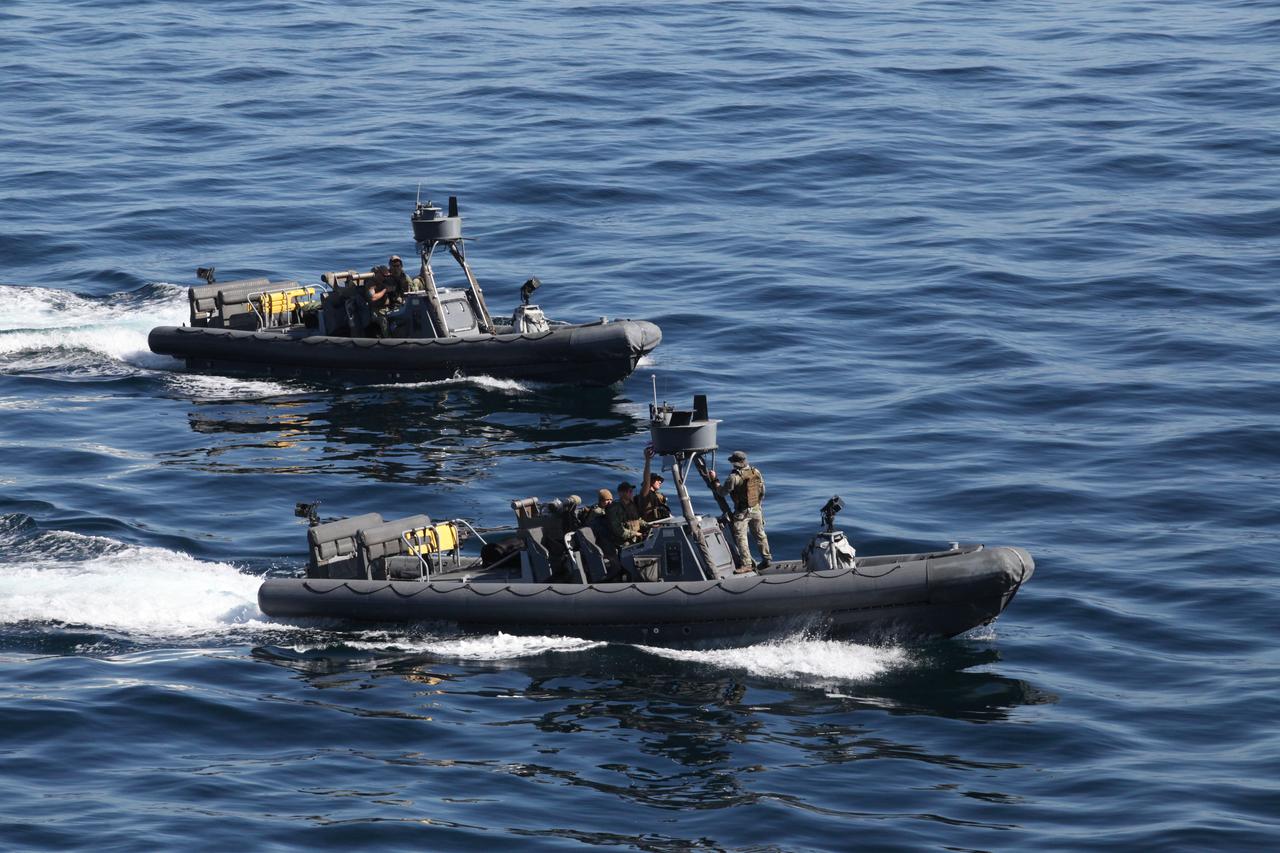 U.S. Navy divers and other personnel in two rigid hull inflatable boats wrap up the final day of Underway Recovery Test 5 in the Pacific Ocean off the coast of California. NASA's Ground Systems Development and Operations Program and the U.S. Navy conducted a series of tests using the USS San Diego's well deck, a test version of the Orion crew module, various watercraft and equipment to prepare for recovery of Orion on its return from deep space missions. The testing allowed the team to demonstrate and evaluate recovery processes, procedures, hardware and personnel in open waters. Orion is the exploration spacecraft designed to carry astronauts to destinations not yet explored by humans, including an asteroid and NASA's Journey to Mars. It will have emergency abort capability, sustain the crew during space travel and provide safe re-entry from deep space return velocities. Orion is scheduled to launch on NASA's Space Launch System in late 2018. For more information, visit http://www.nasa.gov/orion.