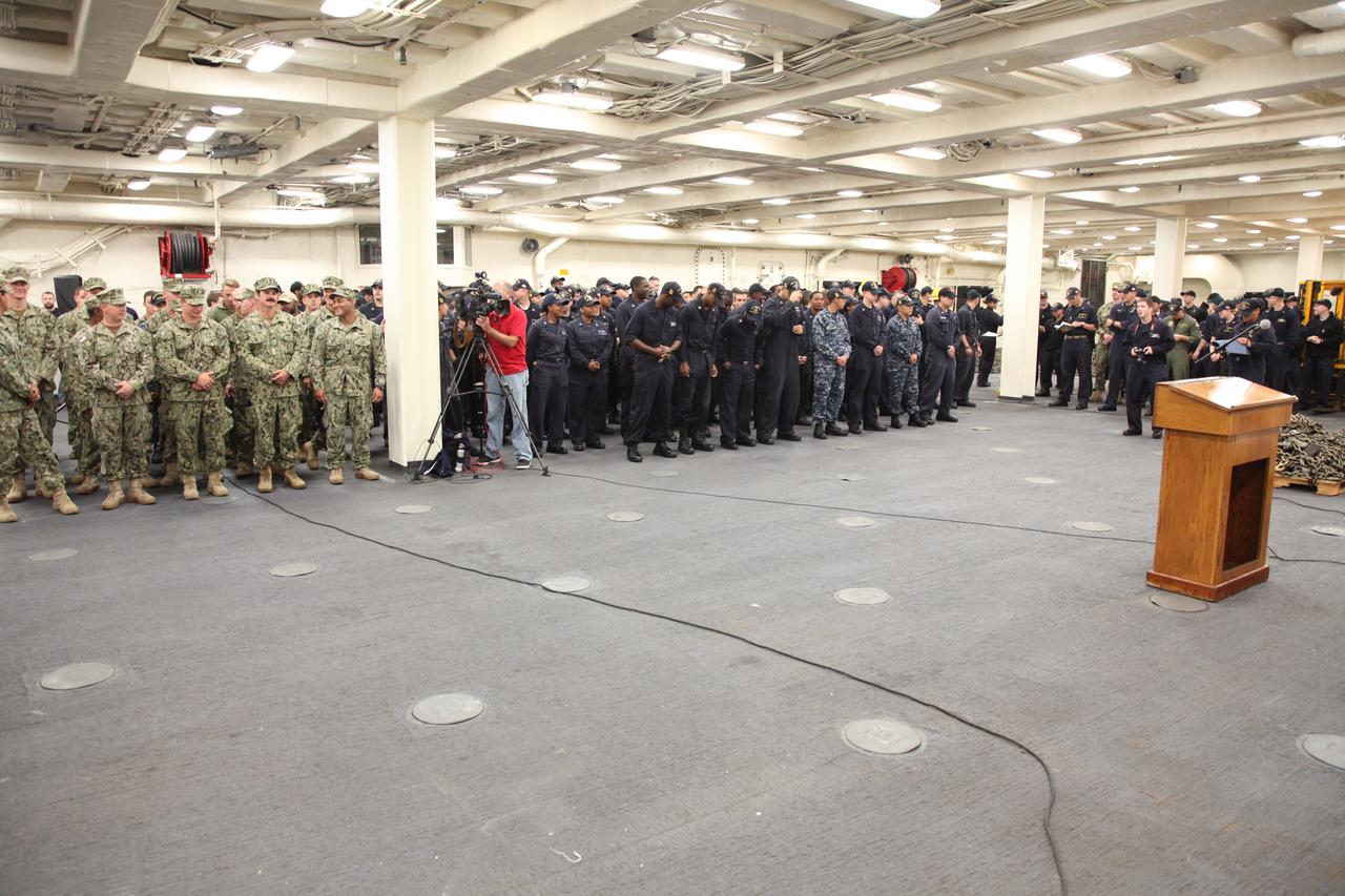 Orion Underway Recovery Test 5 team members gather in the USS San Diego at the end of a series of tests. NASA's Ground Systems Development and Operations Program and the U.S. Navy practiced recovery techniques in the Pacific Ocean off the coast of California over several days, using the well deck of the ship and a test version of the Orion crew module to prepare for recovery of Orion on its return from deep space missions. The testing allowed the team to demonstrate and evaluate recovery processes, procedures, hardware and personnel in open waters. Orion is the exploration spacecraft designed to carry astronauts to destinations not yet explored by humans, including an asteroid and NASA's Journey to Mars. It will have emergency abort capability, sustain the crew during space travel and provide safe re-entry from deep space return velocities. Orion is scheduled to launch on NASA's Space Launch System in late 2018. For more information, visit http://www.nasa.gov/orion. 