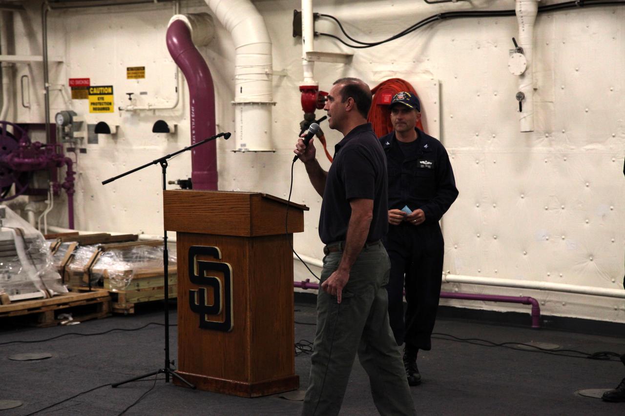 Orion Underway Recovery Test 5 team members gather in the USS San Diego during wrap up of the series of tests. NASA's Ground Systems Development and Operations Program and the U.S. Navy practiced recovery techniques in the Pacific Ocean off the coast of California over several days, using the well deck of the ship and a test version of the Orion crew module to prepare for recovery of Orion on its return from deep space missions. The testing allowed the team to demonstrate and evaluate recovery processes, procedures, hardware and personnel in open waters. Orion is the exploration spacecraft designed to carry astronauts to destinations not yet explored by humans, including an asteroid and NASA's Journey to Mars. It will have emergency abort capability, sustain the crew during space travel and provide safe re-entry from deep space return velocities. Orion is scheduled to launch on NASA's Space Launch System in late 2018. For more information, visit http://www.nasa.gov/orion. 
