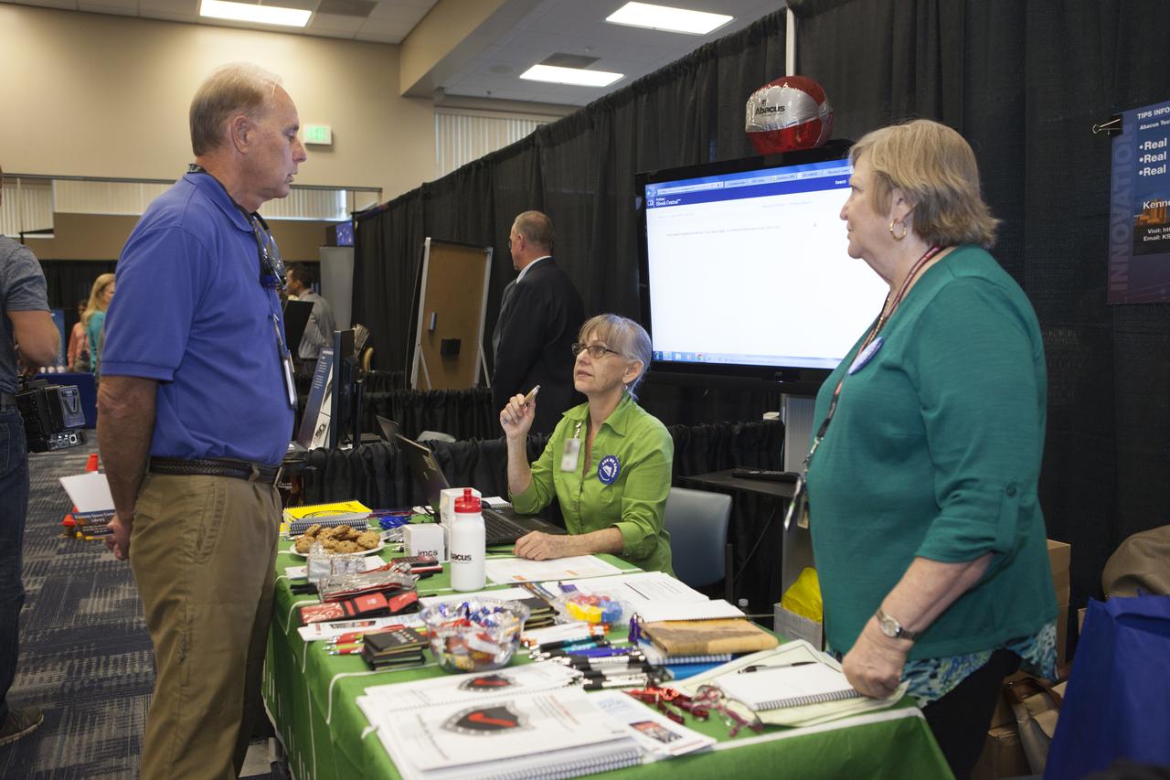 Visitors stop by a NASA booth in the Space Station Processing Facility conference center at NASA's Kennedy Space Center during the 2016 Innovation Expo. Now in its fifth year, the purpose of the Innovation Expo is to help foster innovation and creativity among Kennedy employees who are encouraged to look for ways to do their work better and to propose concepts for tackling future mission needs.