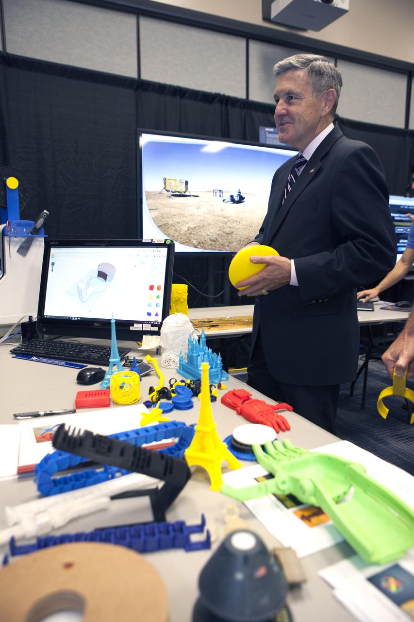 Kennedy Space Center Director Bob Cabana stops by a NASA booth in the Space Station Processing Facility conference center during the 2016 Innovation Expo. Now in its fifth year, the purpose of the Innovation Expo is to help foster innovation and creativity among Kennedy employees who are encouraged to look for ways to do their work better and to propose concepts for tackling future mission needs.