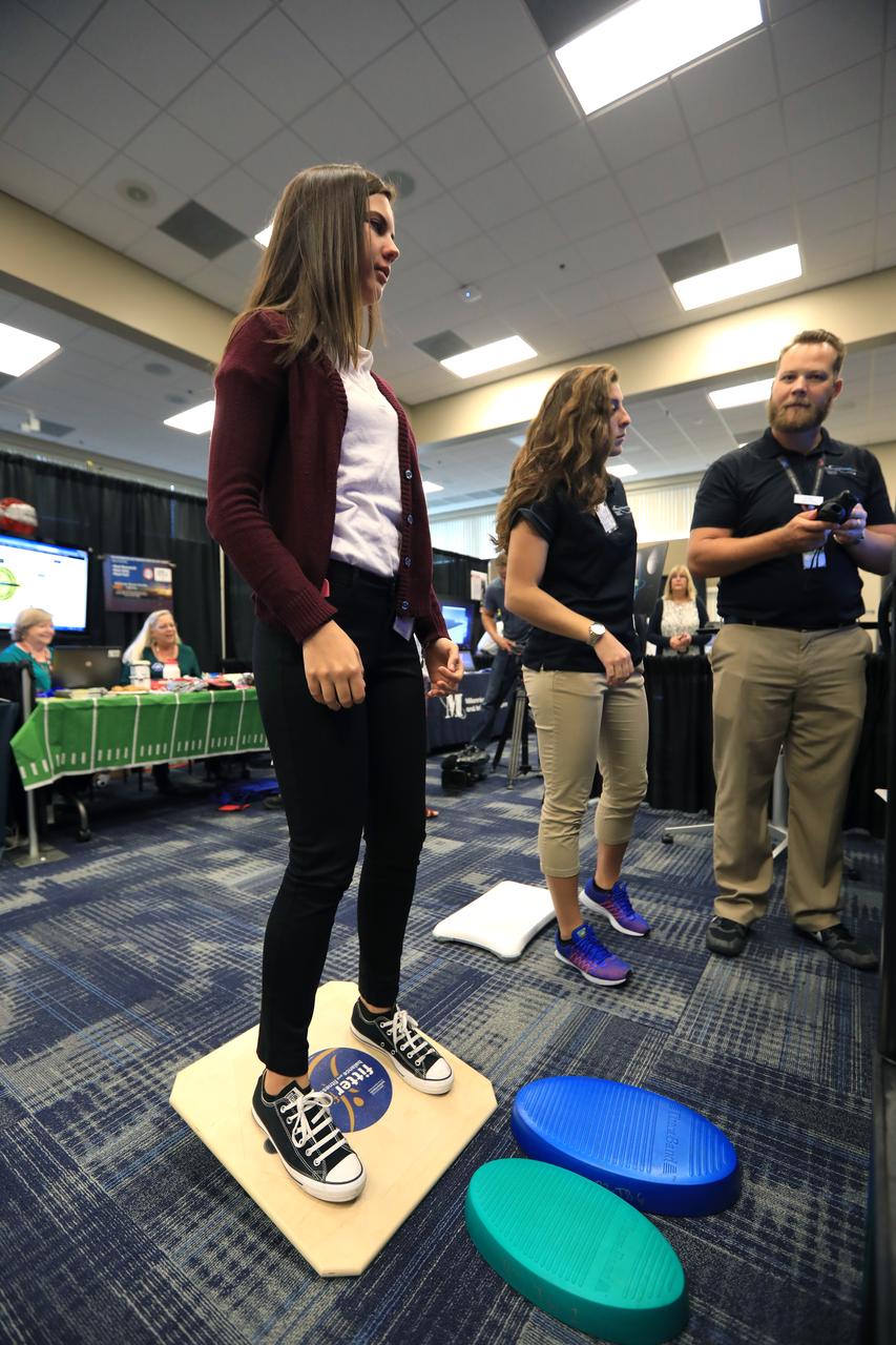Visitors stop by a NASA booth in the Space Station Processing Facility conference center at NASA's Kennedy Space Center during the 2016 Innovation Expo. Now in its fifth year, the purpose of the Innovation Expo is to help foster innovation and creativity among Kennedy employees who are encouraged to look for ways to do their work better and to propose concepts for tackling future mission needs.