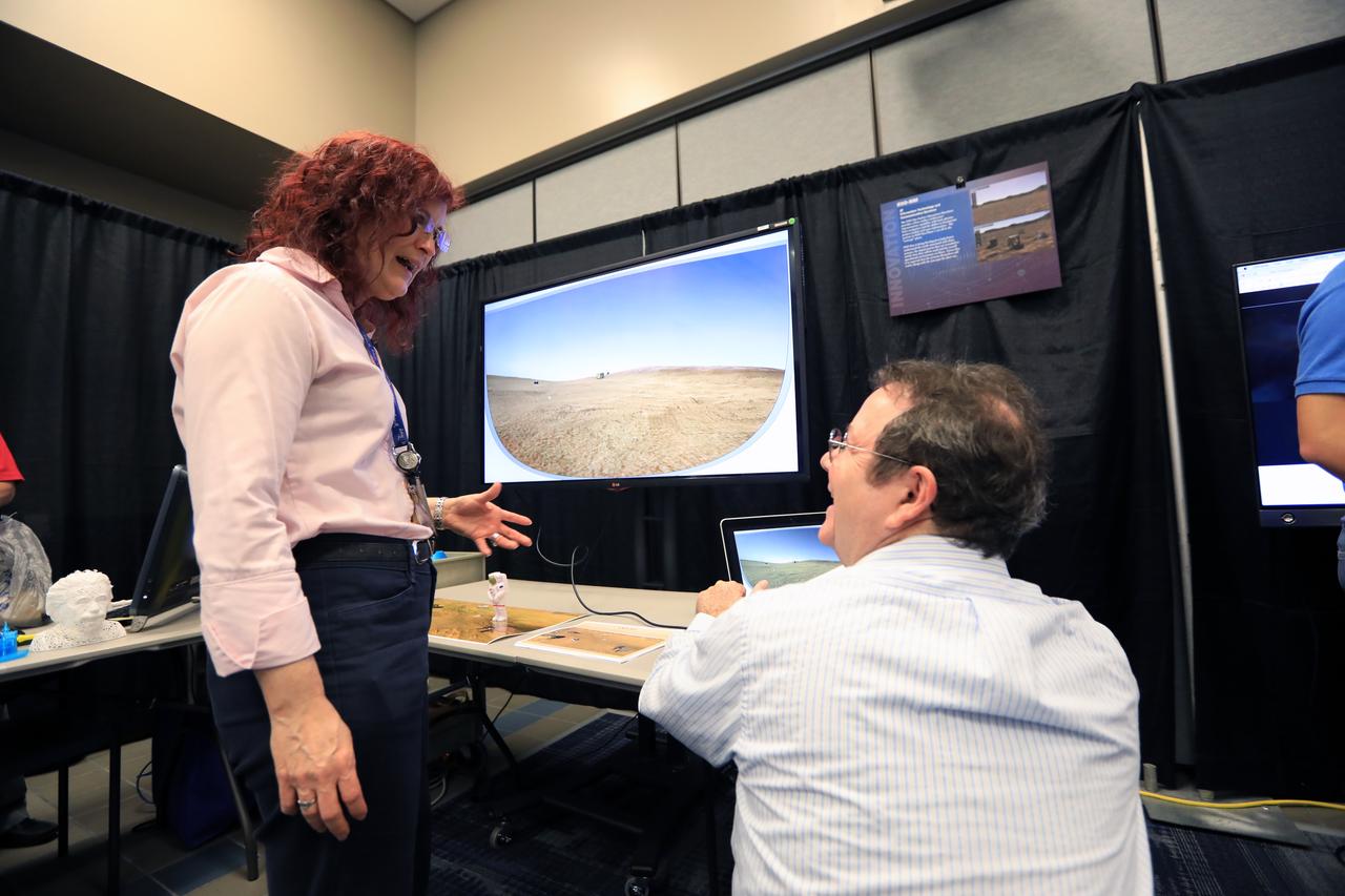 Kennedy Space Center Director Bob Cabana stops by a NASA booth in the Space Station Processing Facility conference center during the 2016 Innovation Expo. Now in its fifth year, the purpose of the Innovation Expo is to help foster innovation and creativity among Kennedy employees who are encouraged to look for ways to do their work better and to propose concepts for tackling future mission needs.