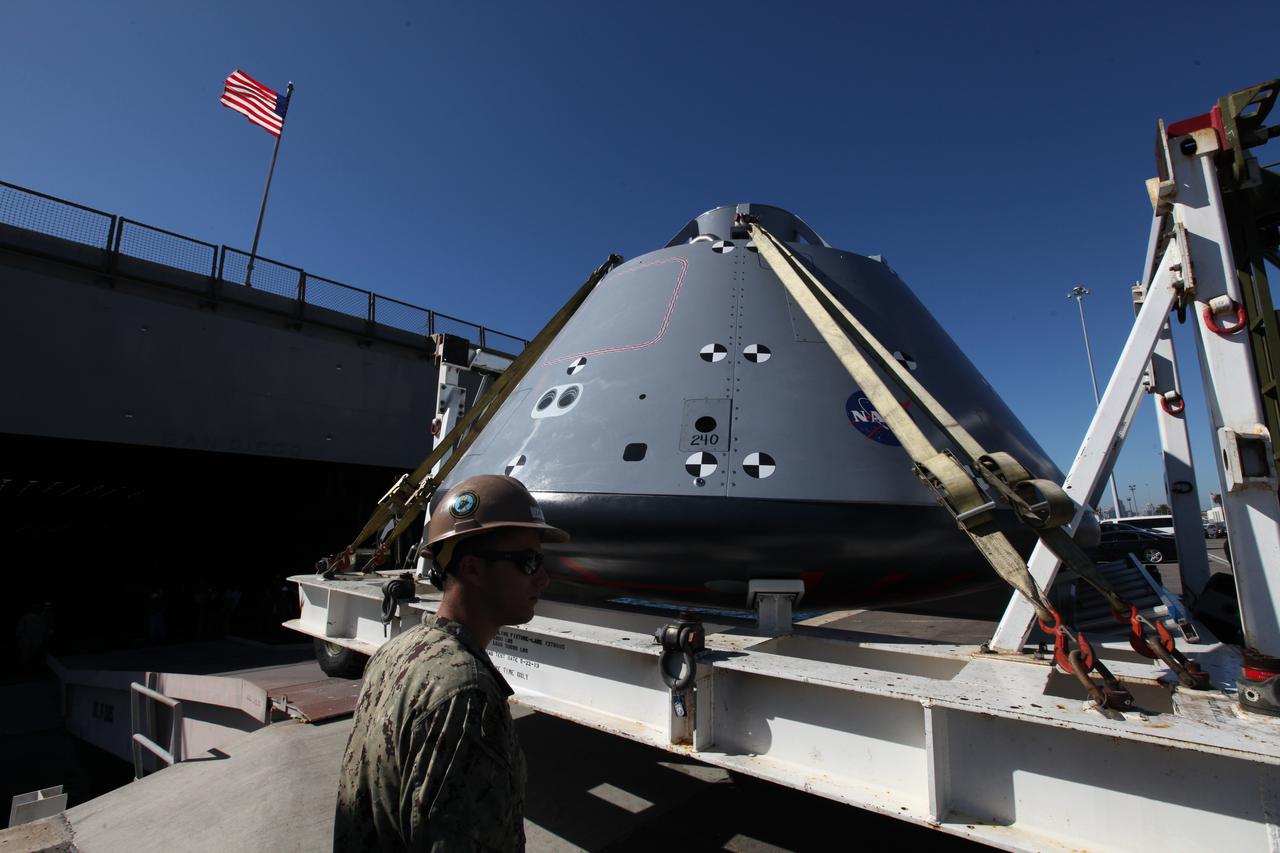 The USS San Diego is docked at Naval Base San Diego in California after returning from Underway Recovery Test 5 in the Pacific Ocean. A test version of the Orion crew module is being offloaded from the well deck of the ship. NASA's Ground Systems Development and Operations Program and the U.S. Navy completed a series of tests using the ship's well deck, the test module, various watercraft and equipment to prepare for recovery of Orion on its return from deep space missions. The testing allowed the team to demonstrate and evaluate recovery processes, procedures, hardware and personnel in open waters. Orion is the exploration spacecraft designed to carry astronauts to destinations not yet explored by humans, including an asteroid and NASA's Journey to Mars. It will have emergency abort capability, sustain the crew during space travel and provide safe re-entry from deep space return velocities. Orion is scheduled to launch on NASA's Space Launch System in late 2018. For more information, visit http://www.nasa.gov/orion.