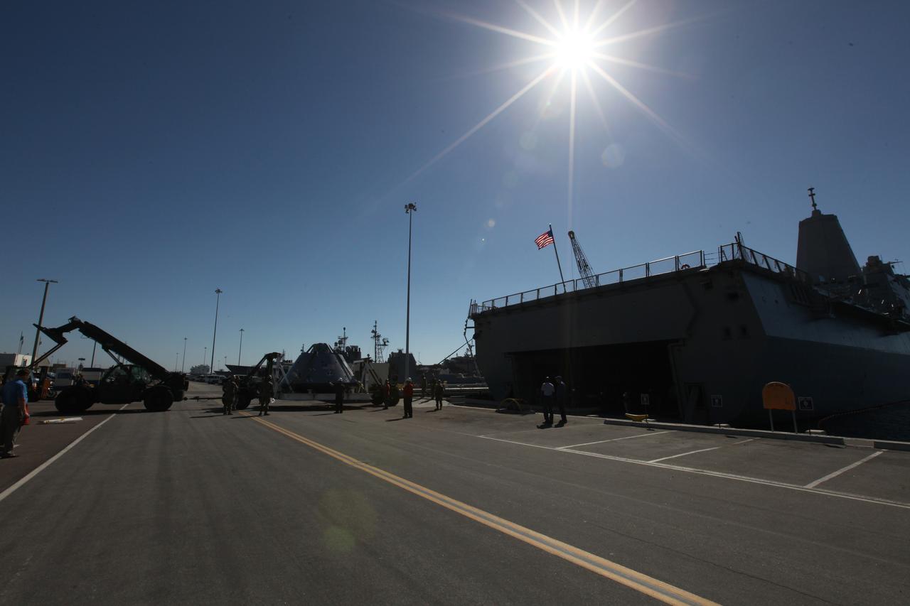 The USS San Diego is docked at Naval Base San Diego in California after returning from Underway Recovery Test 5 in the Pacific Ocean. A test version of the Orion crew module has been offloaded from the well deck of the ship. NASA's Ground Systems Development and Operations Program and the U.S. Navy completed a series of tests using the ship's well deck, the test module, various watercraft and equipment to prepare for recovery of Orion on its return from deep space missions. The testing allowed the team to demonstrate and evaluate recovery processes, procedures, hardware and personnel in open waters. Orion is the exploration spacecraft designed to carry astronauts to destinations not yet explored by humans, including an asteroid and NASA's Journey to Mars. It will have emergency abort capability, sustain the crew during space travel and provide safe re-entry from deep space return velocities. Orion is scheduled to launch on NASA's Space Launch System in late 2018. For more information, visit http://www.nasa.gov/orion.