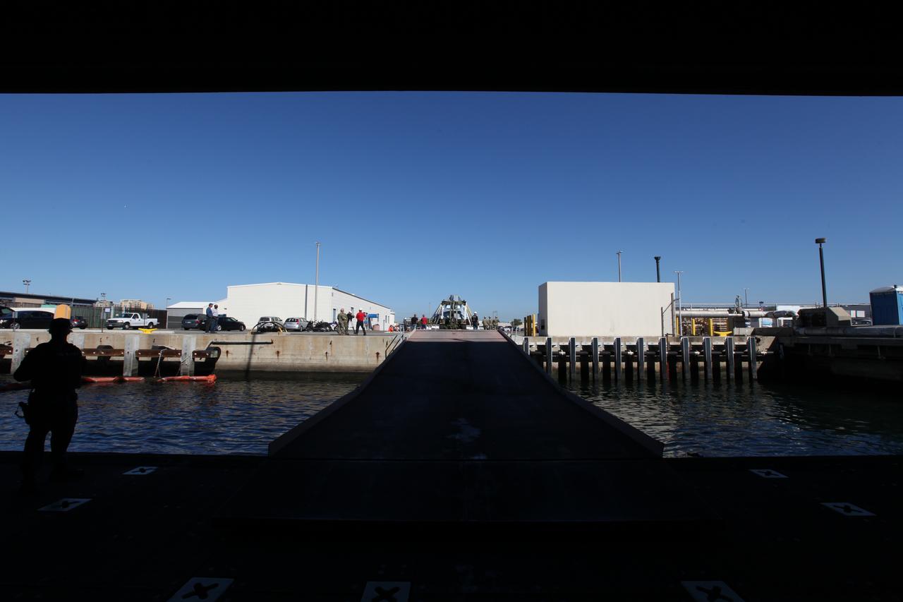 A test version of the Orion crew module has been offloaded from the USS San Diego at Naval Base San Diego in California after returning from Orion Underway Recovery Test 5 in the Pacific Ocean. NASA's Ground Systems Development and Operations Program and the U.S. Navy completed a series of tests using the ship's well deck, the test module, various watercraft and equipment to prepare for recovery of Orion on its return from deep space missions. The testing allowed the team to demonstrate and evaluate recovery processes, procedures, hardware and personnel in open waters. Orion is the exploration spacecraft designed to carry astronauts to destinations not yet explored by humans, including an asteroid and NASA's Journey to Mars. It will have emergency abort capability, sustain the crew during space travel and provide safe re-entry from deep space return velocities. Orion is scheduled to launch on NASA's Space Launch System in late 2018. For more information, visit http://www.nasa.gov/orion.