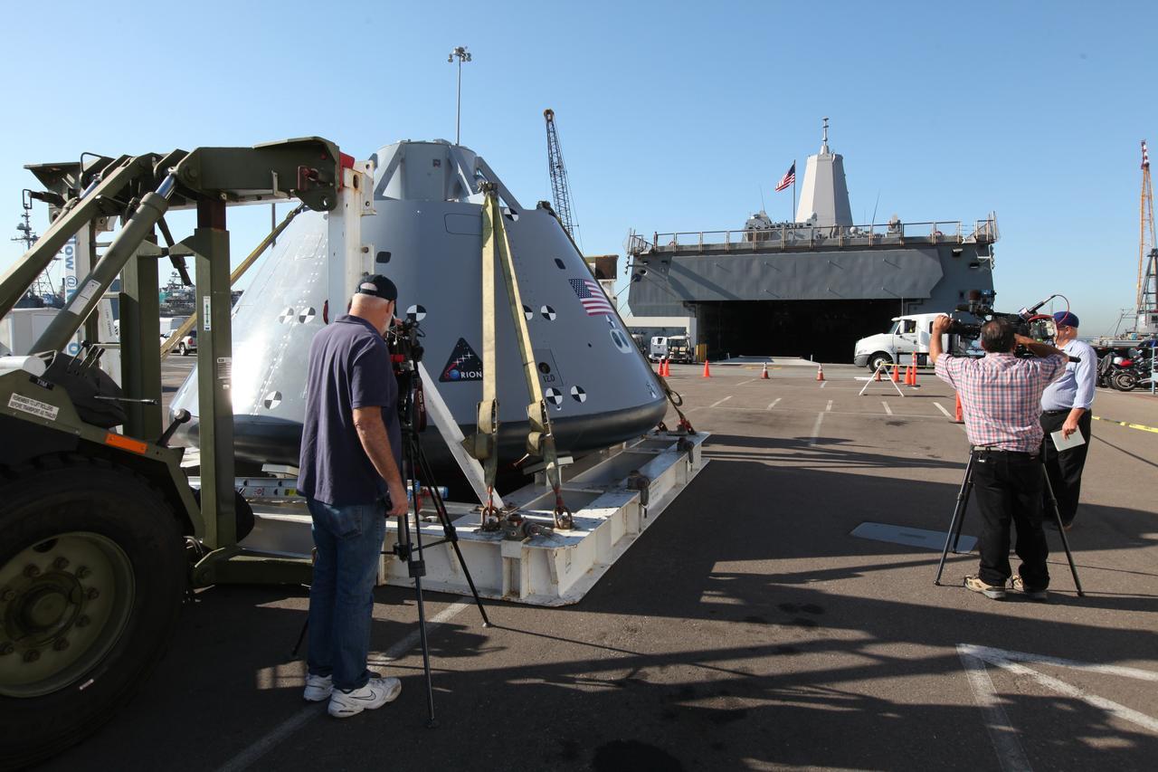The USS San Diego is docked at Naval Base San Diego in California after returning from Underway Recovery Test 5 in the Pacific Ocean. A test version of the Orion crew module, secured on its handling fixture, was offloaded from the well deck of the ship. NASA's Ground Systems Development and Operations Program and the U.S. Navy completed a series of tests using the ship's well deck, the test module, various watercraft and equipment to prepare for recovery of Orion on its return from deep space missions. The testing allowed the team to demonstrate and evaluate recovery processes, procedures, hardware and personnel in open waters. Orion is the exploration spacecraft designed to carry astronauts to destinations not yet explored by humans, including an asteroid and NASA's Journey to Mars. It will have emergency abort capability, sustain the crew during space travel and provide safe re-entry from deep space return velocities. Orion is scheduled to launch on NASA's Space Launch System in late 2018. For more information, visit http://www.nasa.gov/orion. 