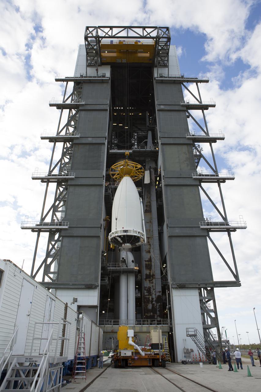 A crane is used to lift the payload fairing containing NOAA's Geostationary Operational Environmental Satellite (GOES-R) at the Vertical Integration Facility at Space Launch Complex 41 at Cape Canaveral Air Force Station in Florida. GOES-R will be mated to the United Launch Alliance Atlas V Centaur upper stage in preparation for launch in November. GOES-R is the first satellite in a series of next-generation NOAA GOES Satellites.