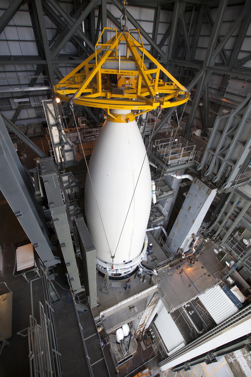 Enclosed in its payload fairing, NOAA's Geostationary Operational Environmental Satellite (GOES-R) is lifted into the Vertical Integration Facility at Space Launch Complex 41 at Cape Canaveral Air Force Station in Florida. GOES-R will be mated to the United Launch Alliance Atlas V Centaur upper stage in preparation for launch aboard the rocket in November. GOES-R is the first satellite in a series of next-generation NOAA GOES Satellites. 