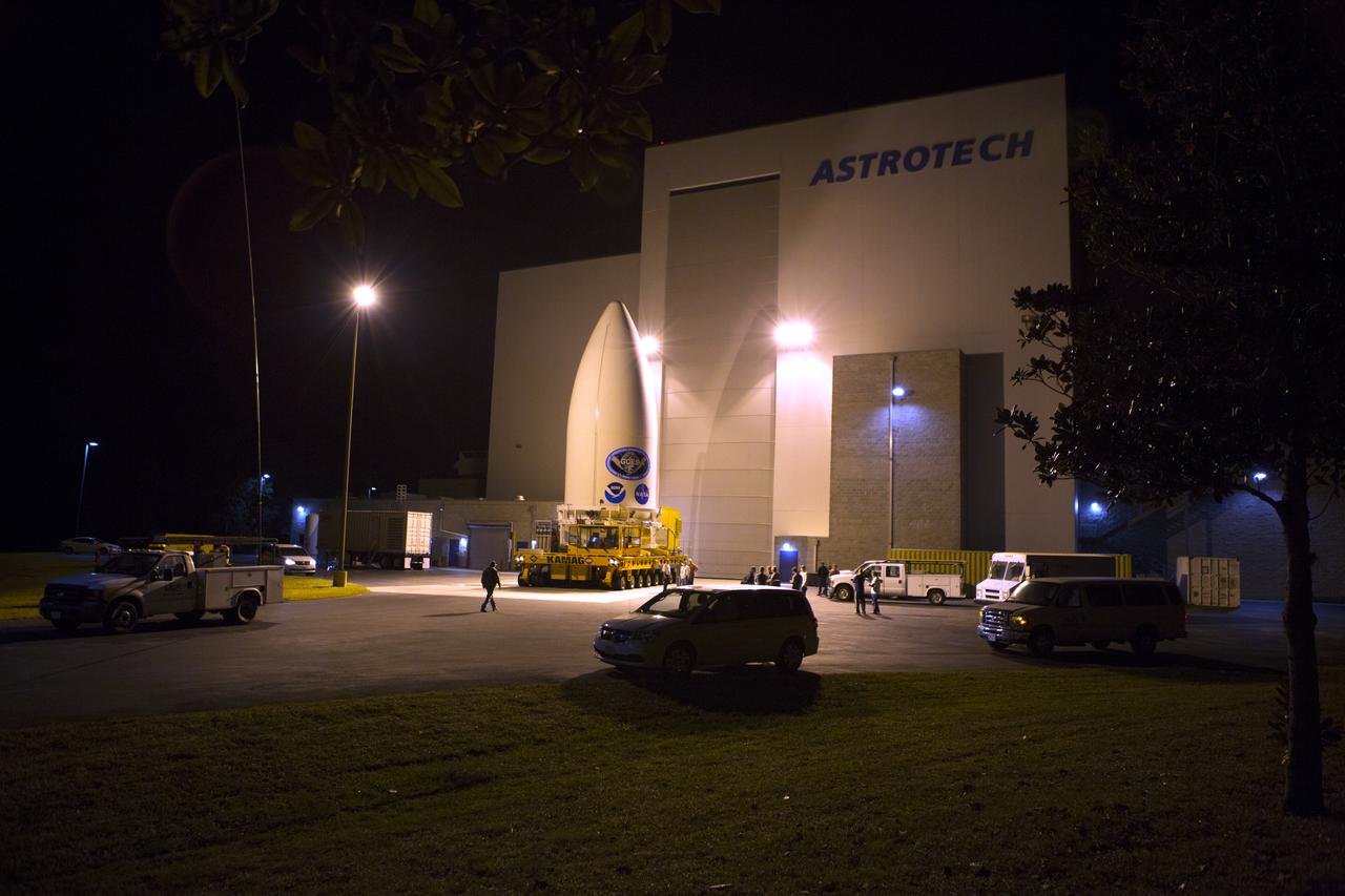 Enclosed in its payload fairing, NOAA's Geostationary Operational Environmental Satellite (GOES-R) departs from the Astrotech payload processing facility in Titusville, Florida, near NASA's Kennedy Space Center. GOES-R will be transported to the Vertical Integration Facility at Space Launch Complex 41 at Cape Canaveral Air Force Station. The satellite will launch aboard a United Launch Alliance Atlas V rocket in November. GOES-R is the first satellite in a series of next-generation NOAA GOES Satellites.