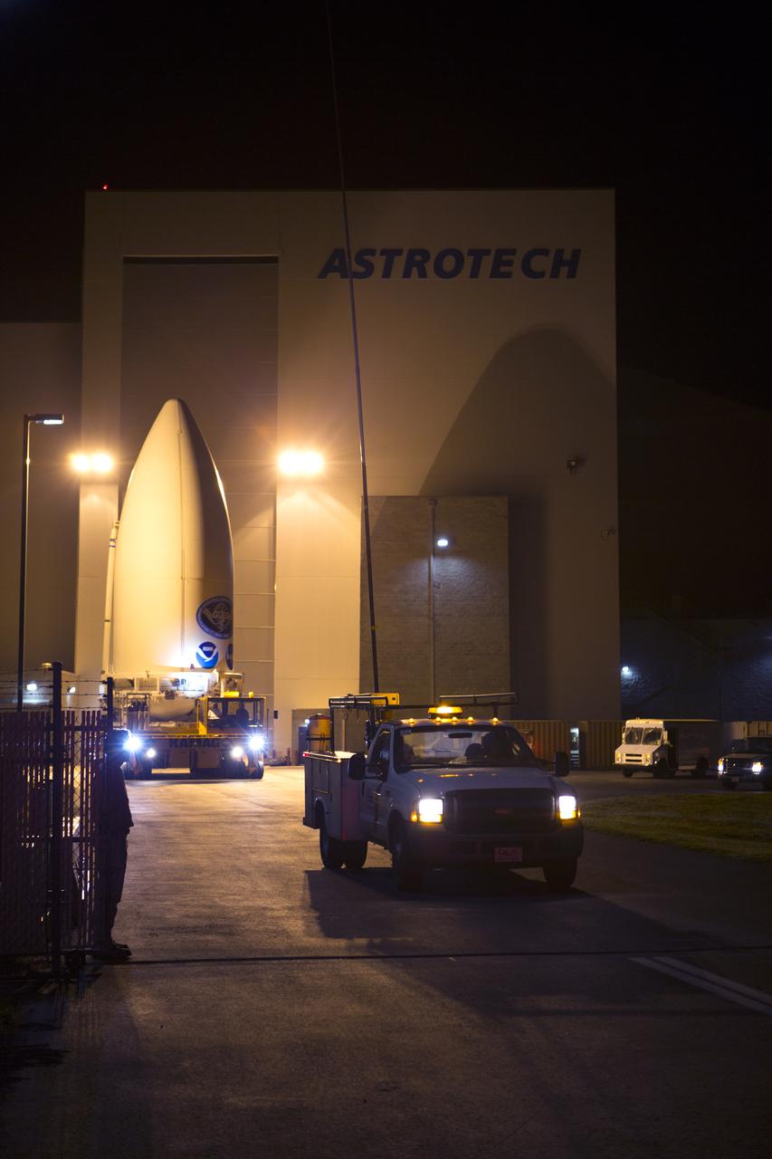 Enclosed in its payload fairing, NOAA's Geostationary Operational Environmental Satellite (GOES-R) departs from the Astrotech payload processing facility in Titusville, Florida, near NASA's Kennedy Space Center. GOES-R will be transported to the Vertical Integration Facility at Space Launch Complex 41 at Cape Canaveral Air Force Station. The satellite will launch aboard a United Launch Alliance Atlas V rocket in November. GOES-R is the first satellite in a series of next-generation NOAA GOES Satellites.