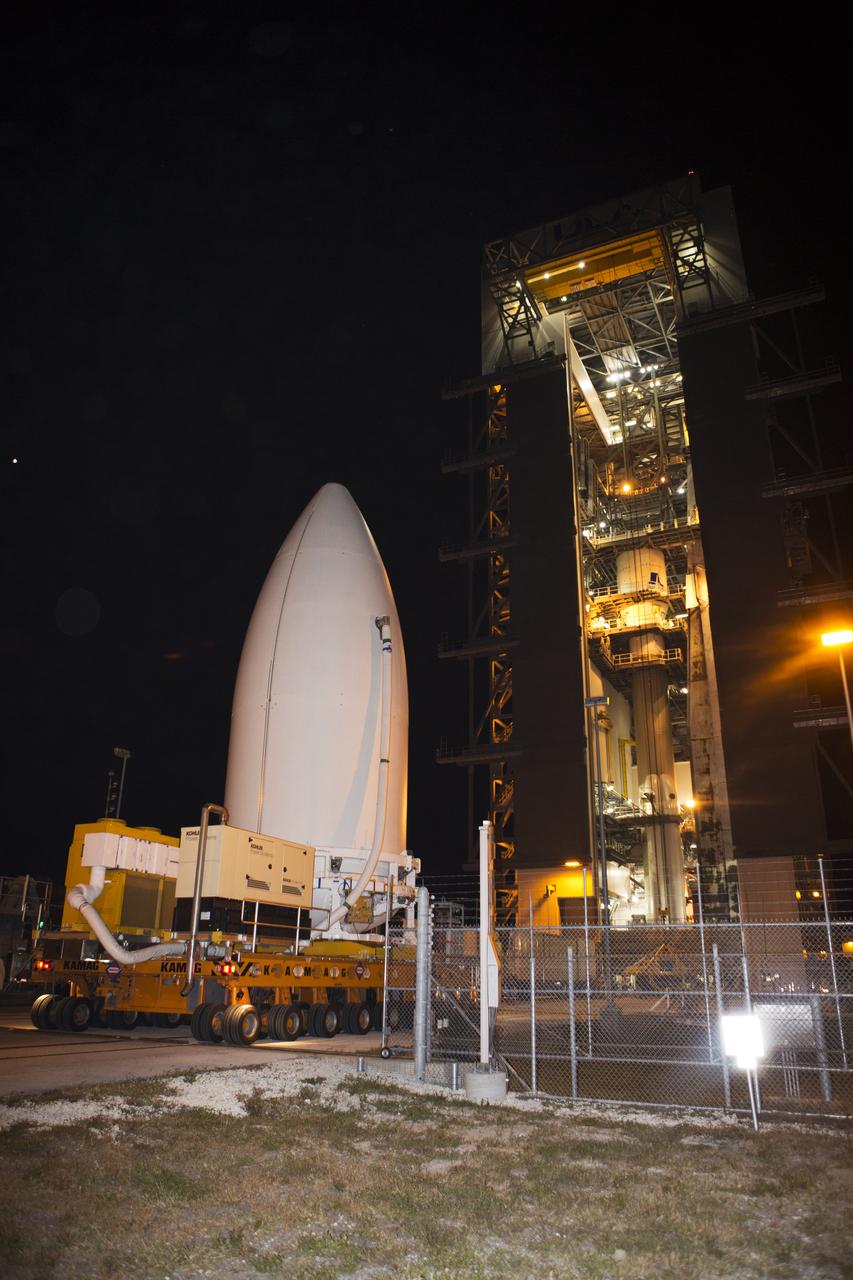 Enclosed in its payload fairing, NOAA's Geostationary Operational Environmental Satellite (GOES-R) arrives at the Vertical Integration Facility at Space Launch Complex 41 at Cape Canaveral Air Force Station. GOES-R will be stacked atop the United Launch Alliance Atlas V Centaur upper stage. The satellite will launch atop the Atlas V rocket in November. GOES-R is the first satellite in a series of next-generation NOAA GOES Satellites. 